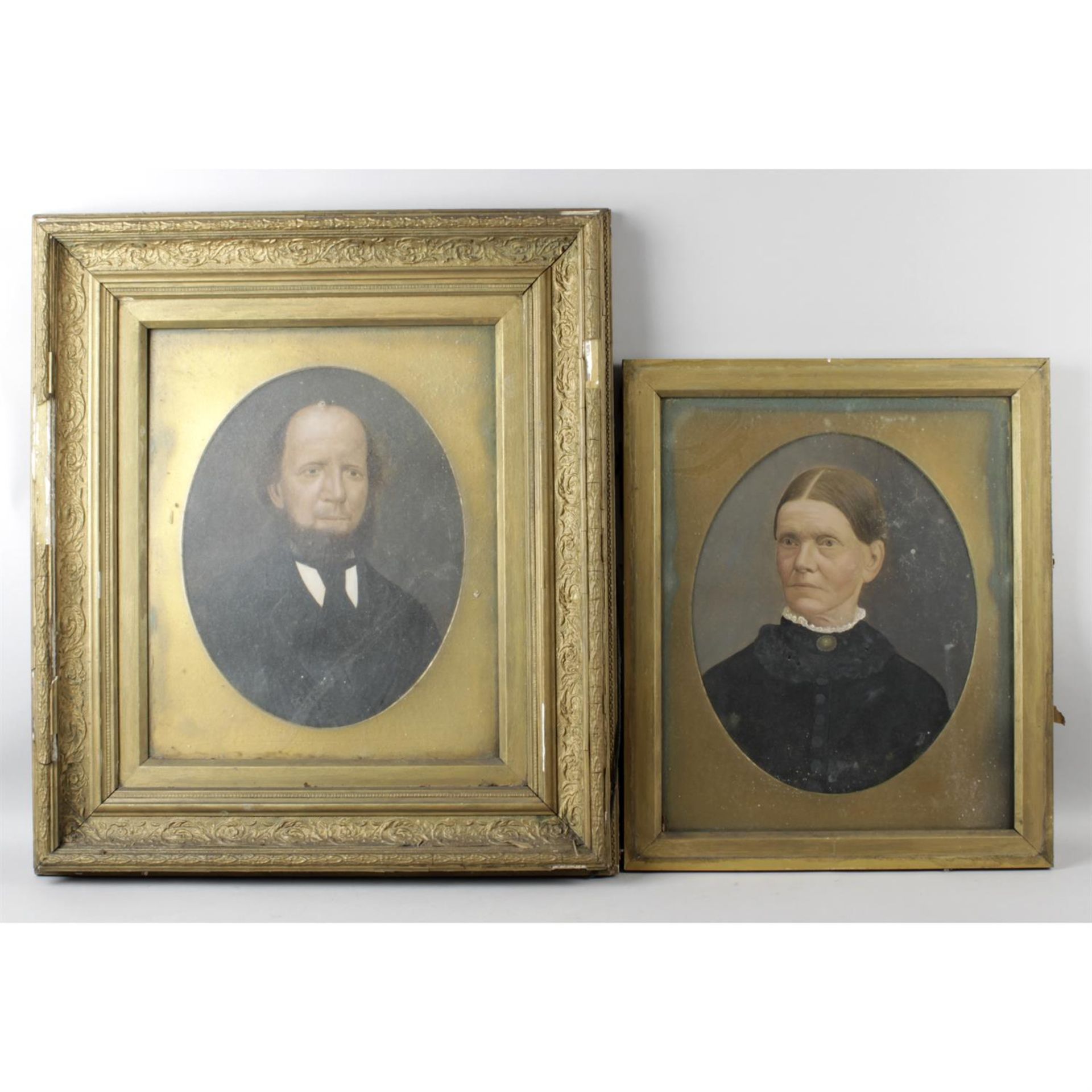 A pair of late 19th/early 20th century framed head and shoulder portrait prints.