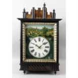 A 19th century stained wooden cased wall clock.