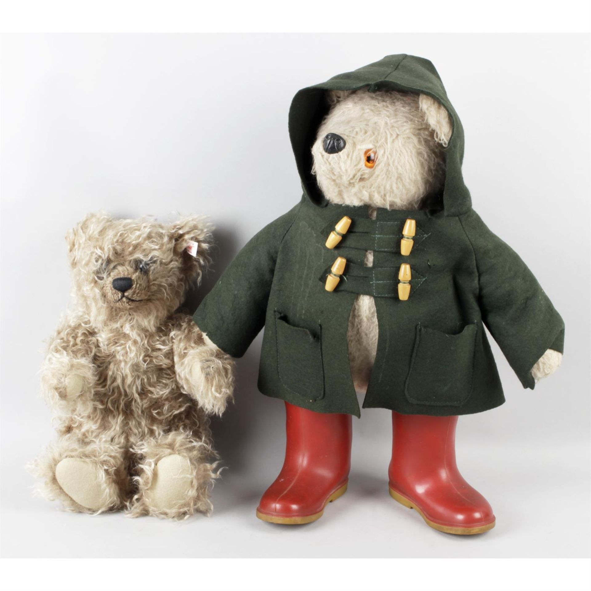 A modern Steiff 'Grizzly Ted' teddy, together with a Gabrielle Designs Paddington Bear soft toy. (2)
