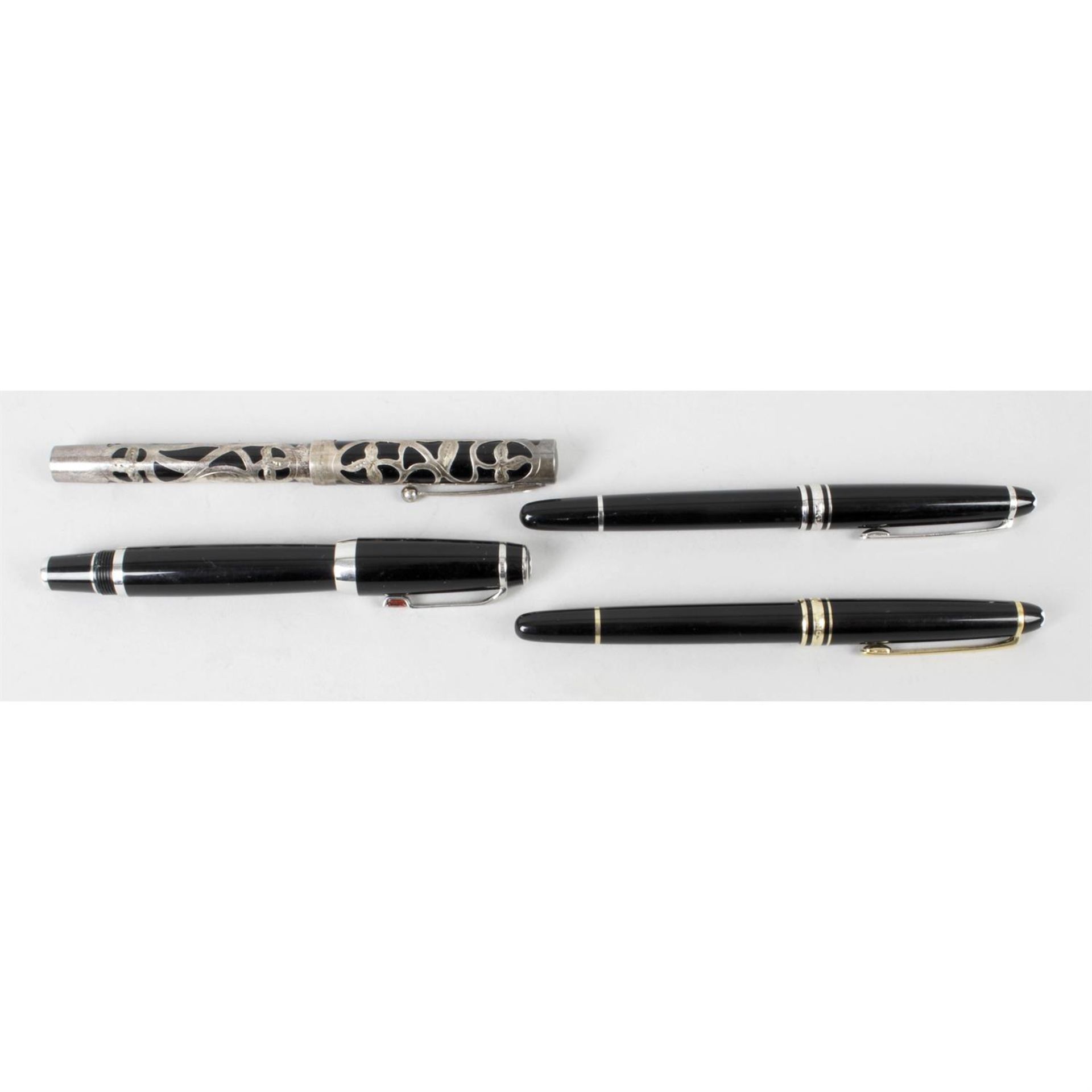 A selection of pens, to include Montblanc and Sheaffer examples. (4)