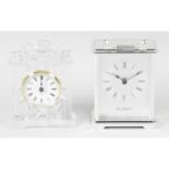 A mixed selection of assorted modern quartz clocks.