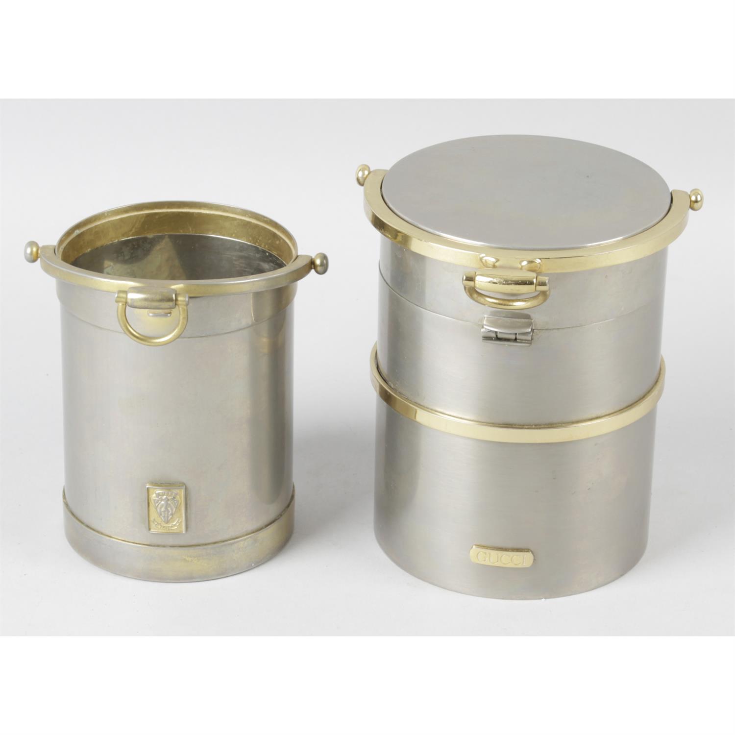 A 1970's Gucci metal ice bucket, together with a similar example (2).