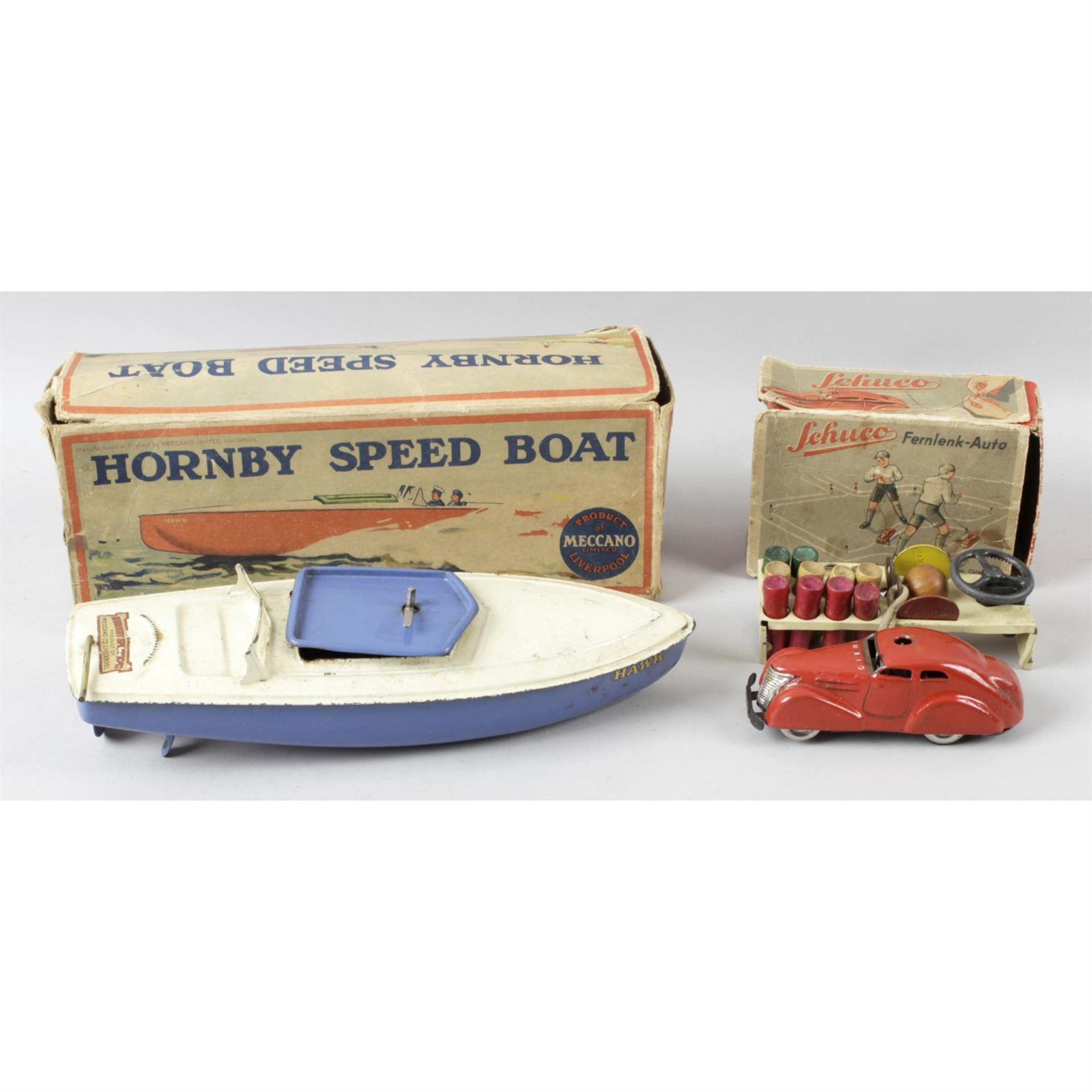 A Hornby 'Hawk' tinplate and clockwork model No.1 speedboat , together with a Schuco '3000'