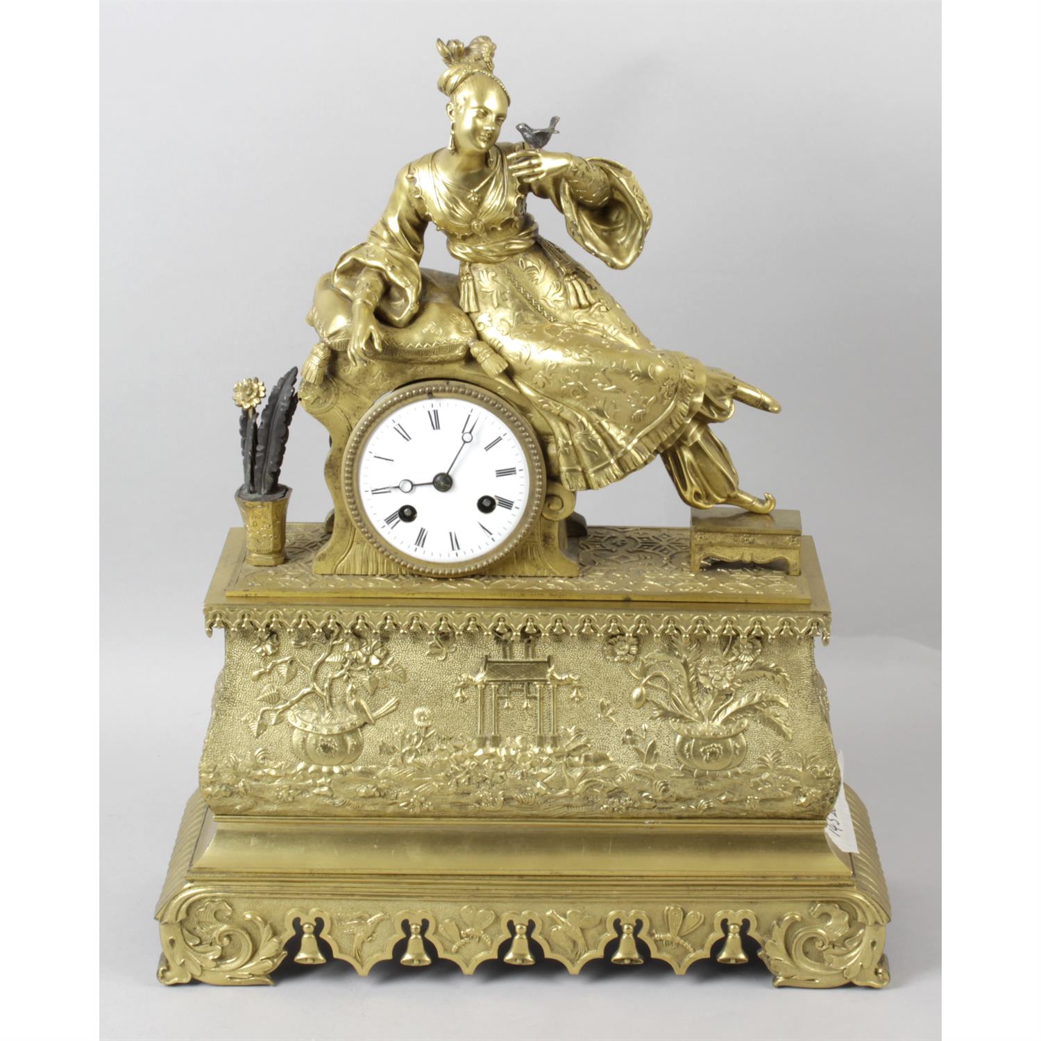 A 19th century bronze and gilt bronze cased mantel clock.