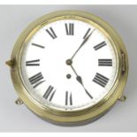 A late 19th/ early 20th century bulkhead style ships clock.