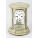 An early 20th century green marble and glass mantel clock.