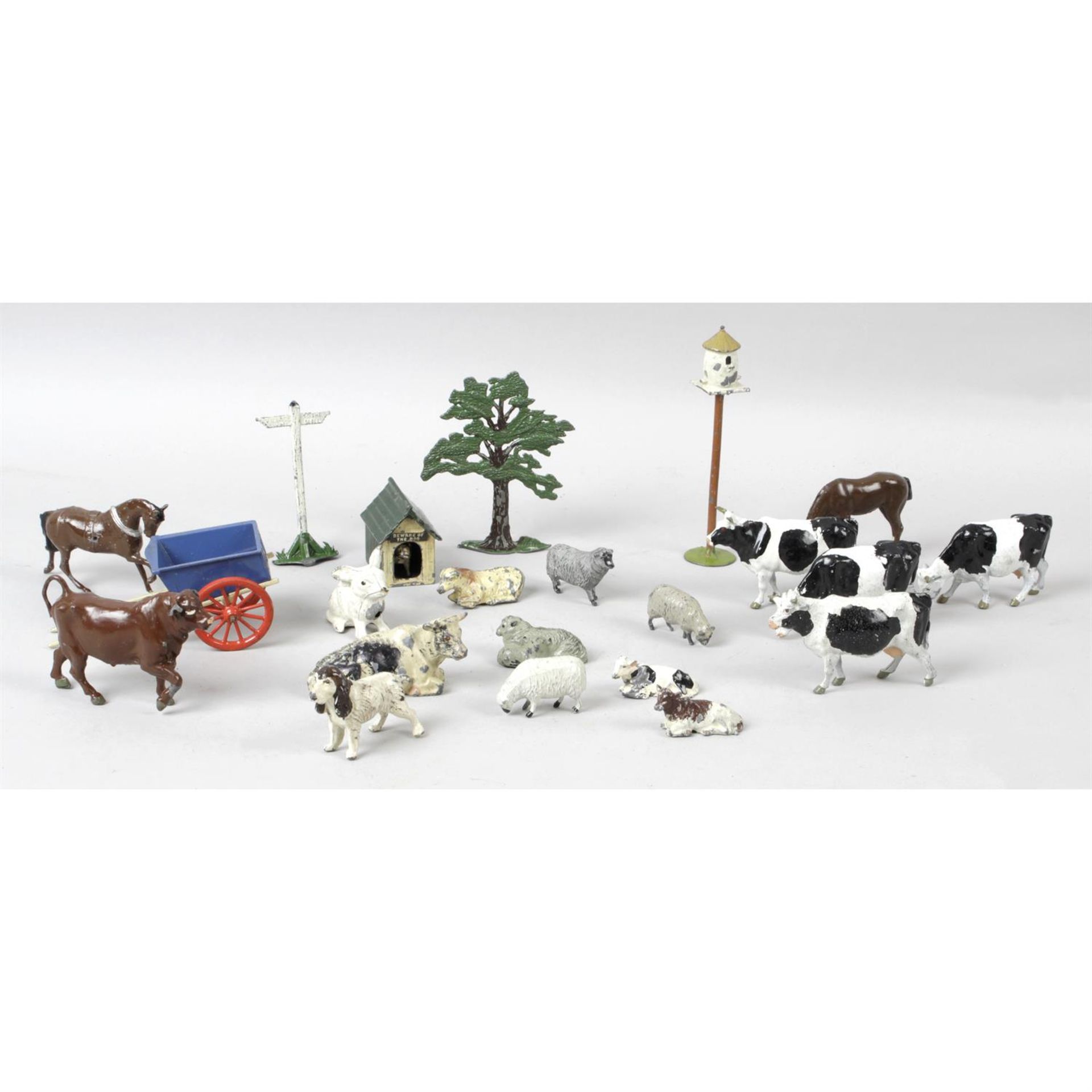 A mixed selection of assorted, hand painted cast metal farm yard animal figures.