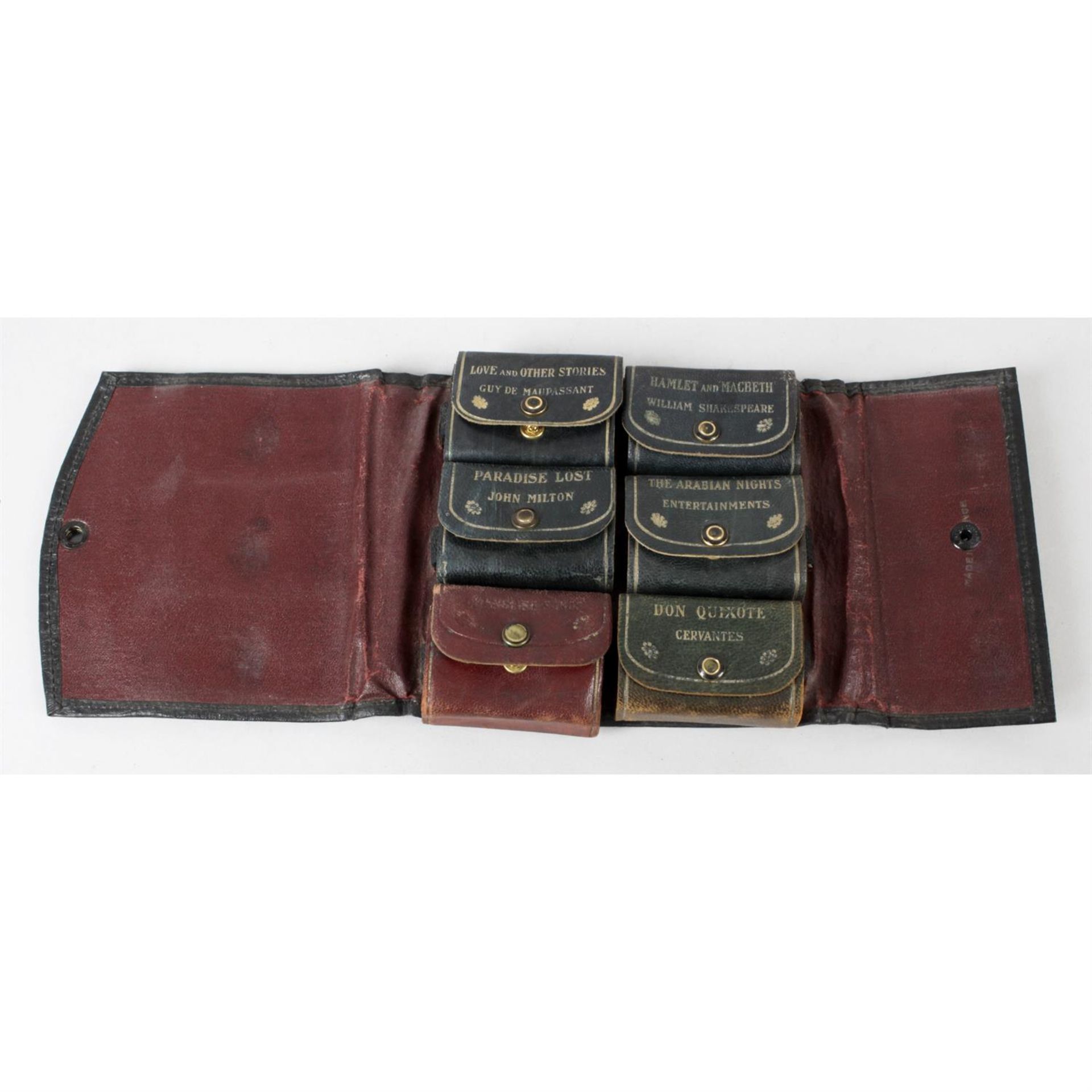 An unusual late 19th/early 20th century black faux leather pouch.