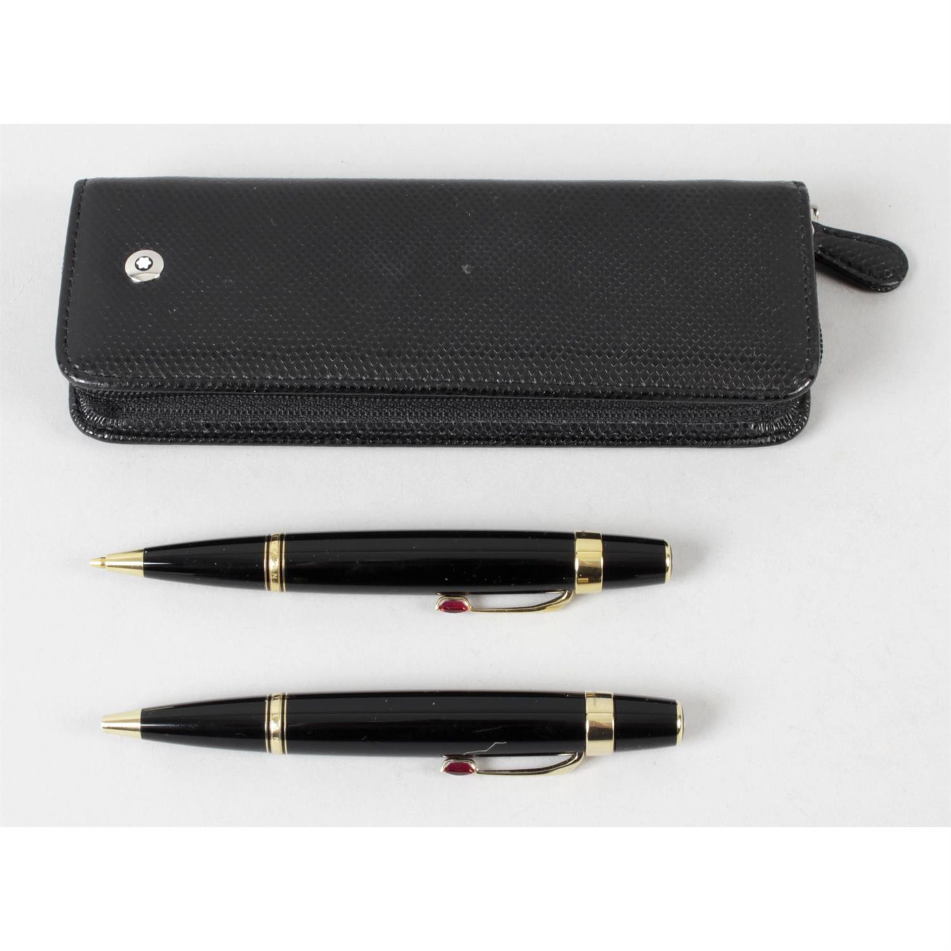 A Mont Blanc propelling pen, with a matching propelling pencil.