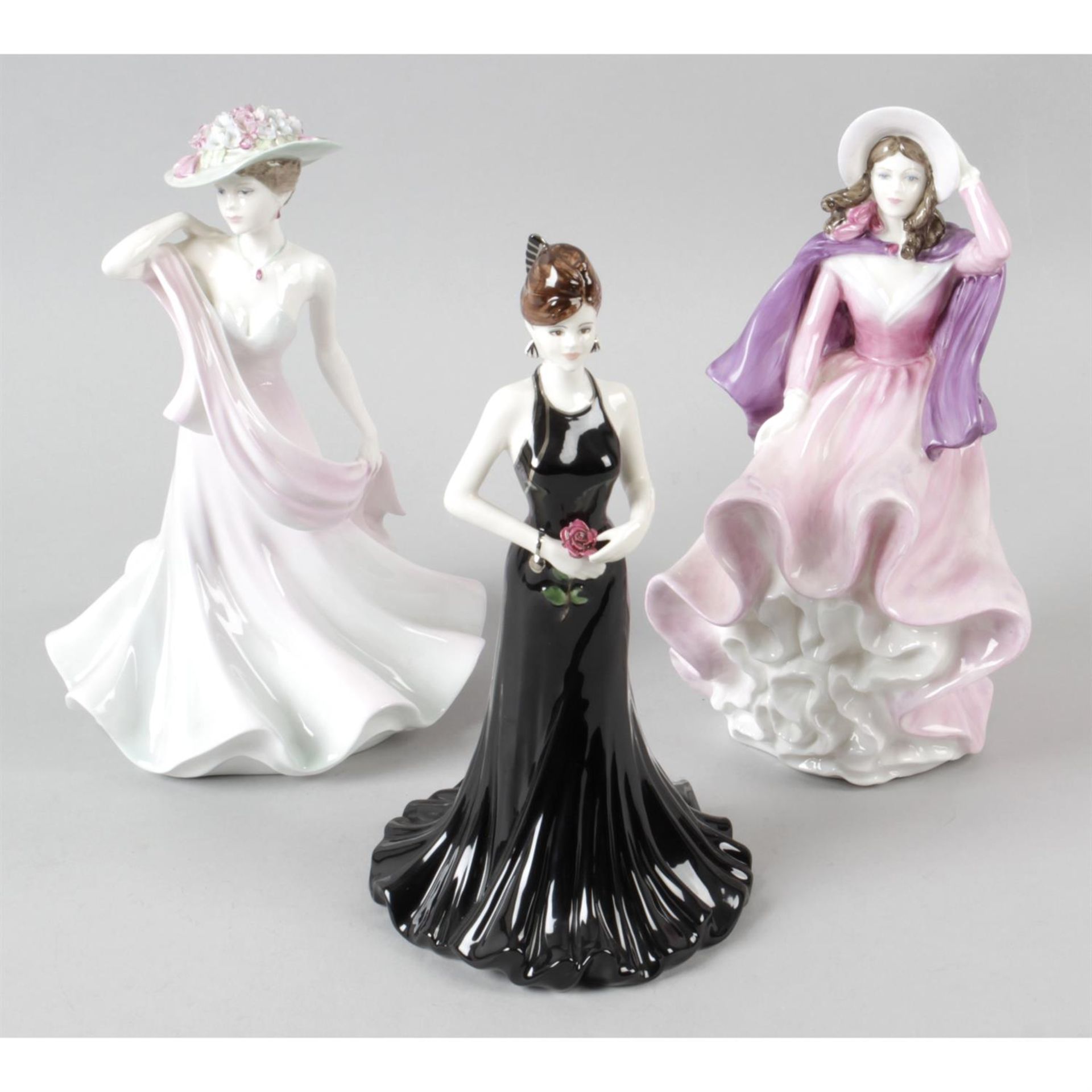 A selection of Coalport figurines.