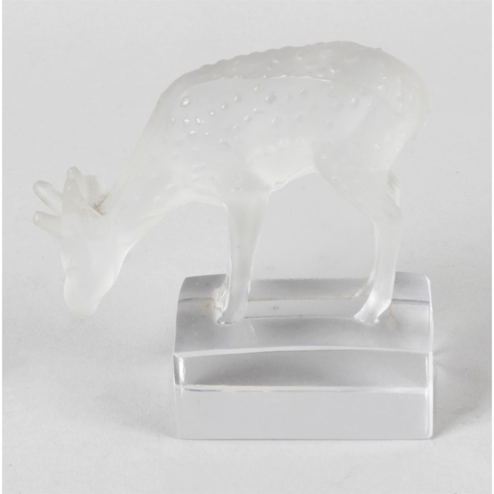 A Lalique frosted and clear glass study of a deer.
