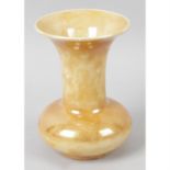 A Ruskin orange lustre glazed vase.