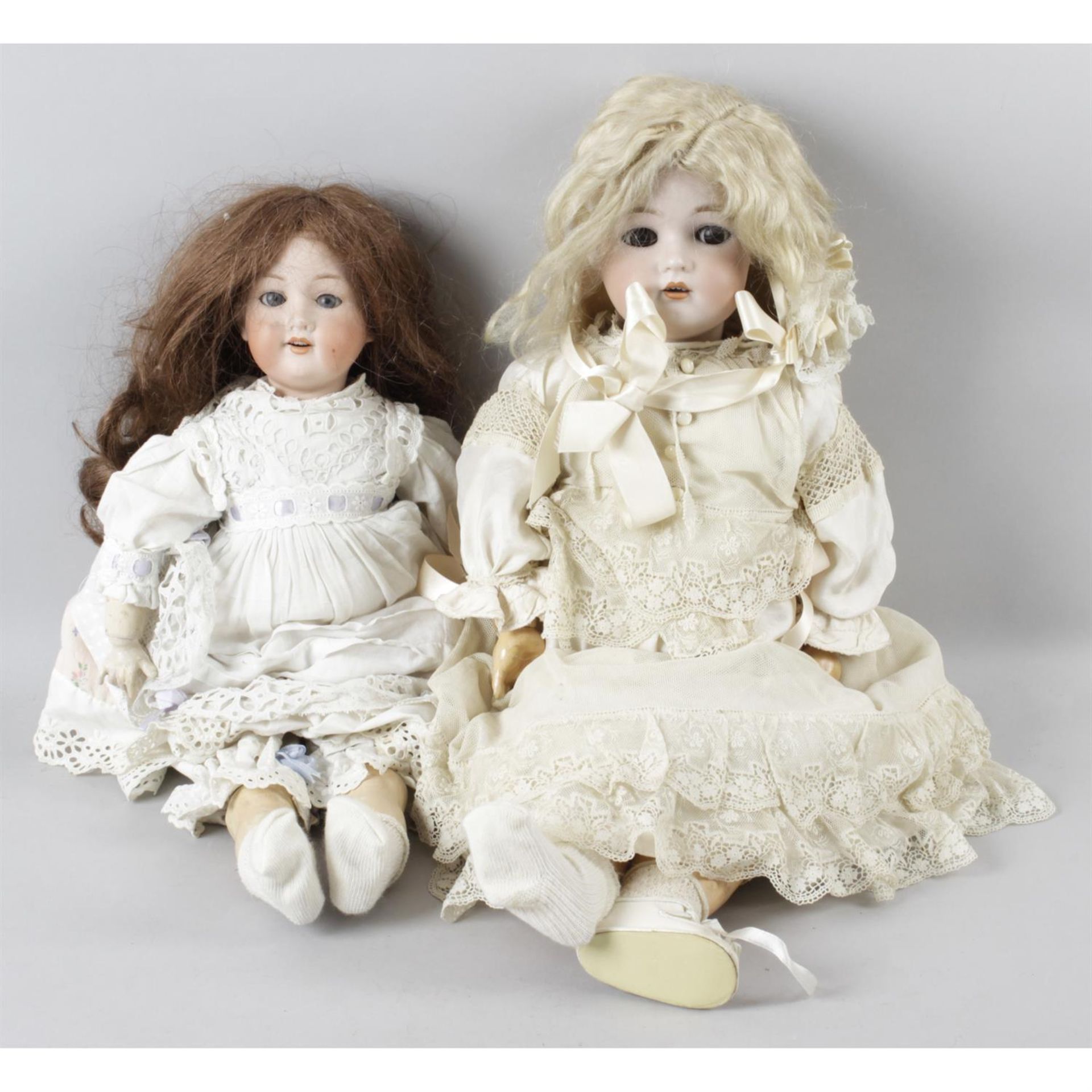 A mixed selection of assorted dolls. (3)