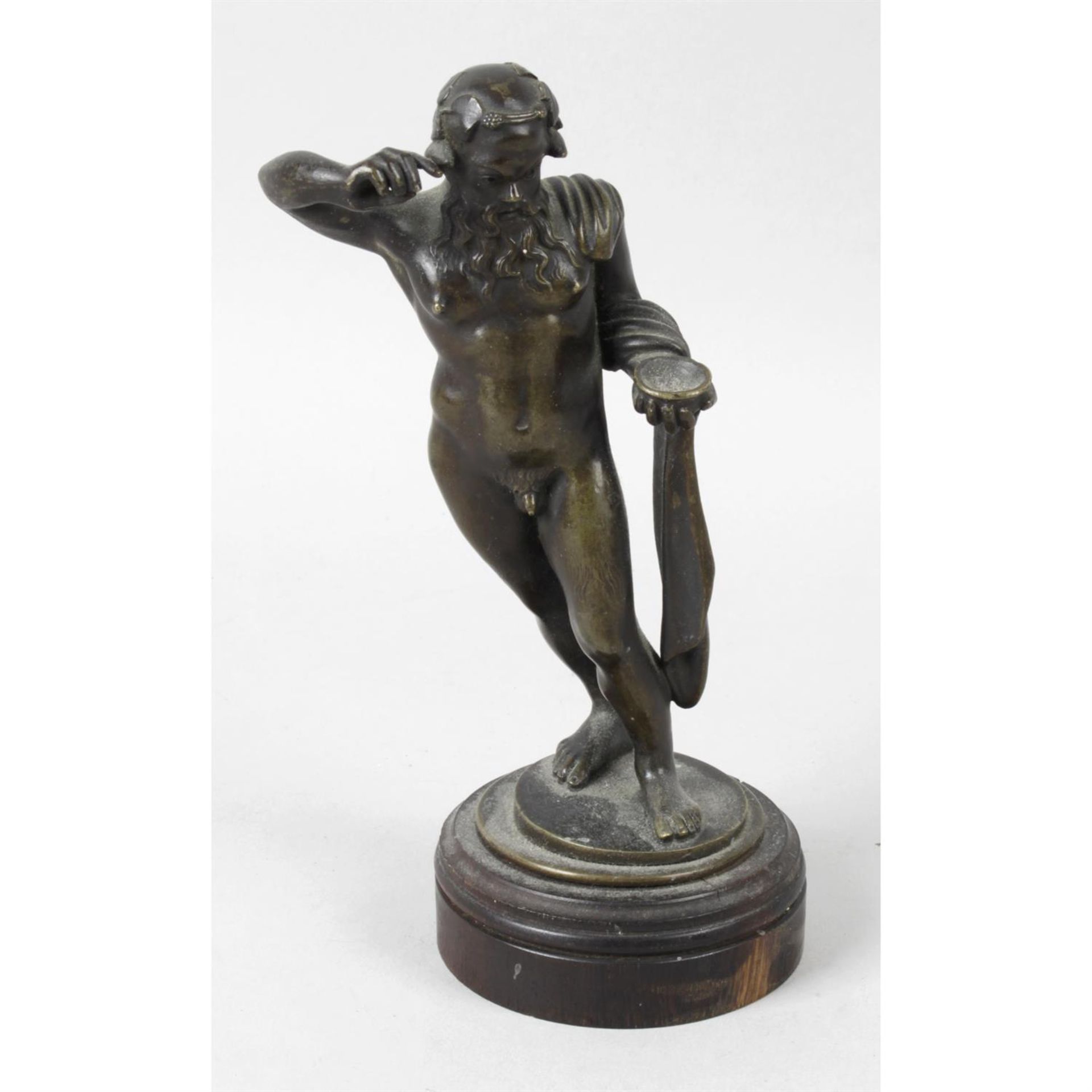 A 19th century bronze figure modelled as a bearded naked male.
