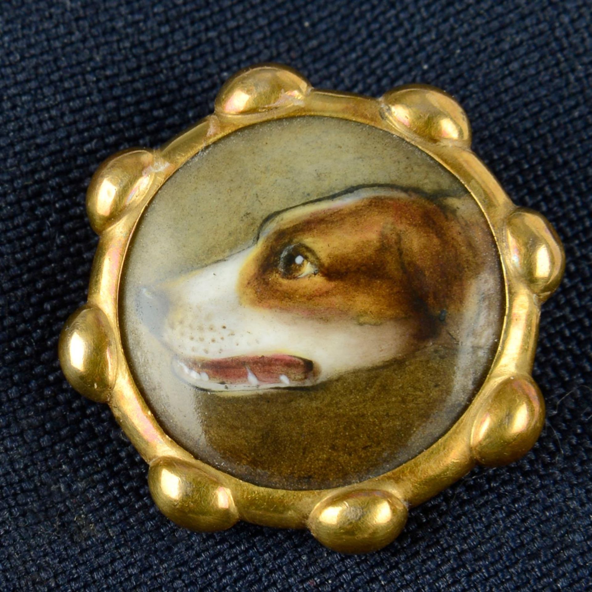 A Victorian gold enamel stickpin, possibly depicting a beagle hound dog head.