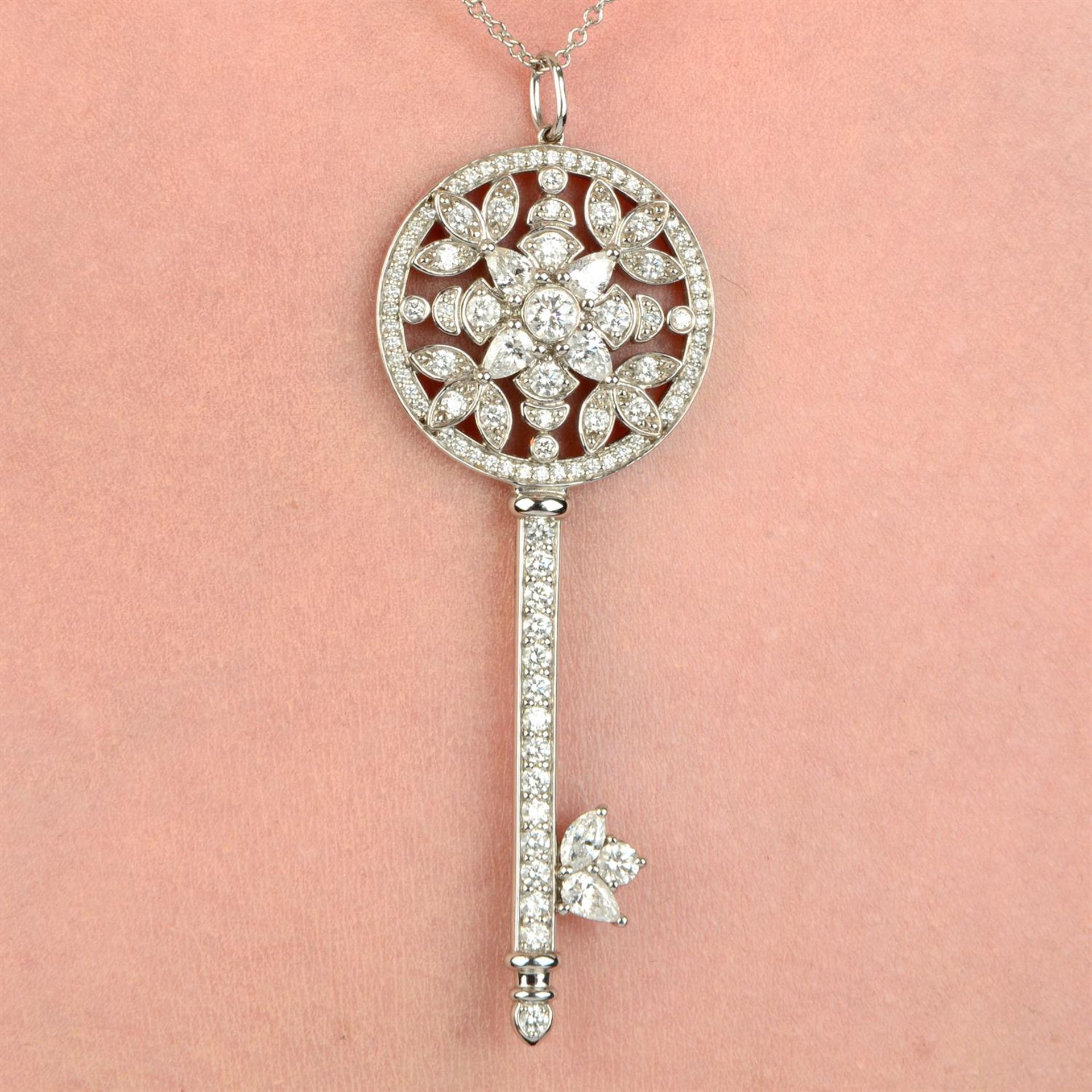 A platinum vari-cut diamond 'Garden' key, with chain, by Tiffany & Co.