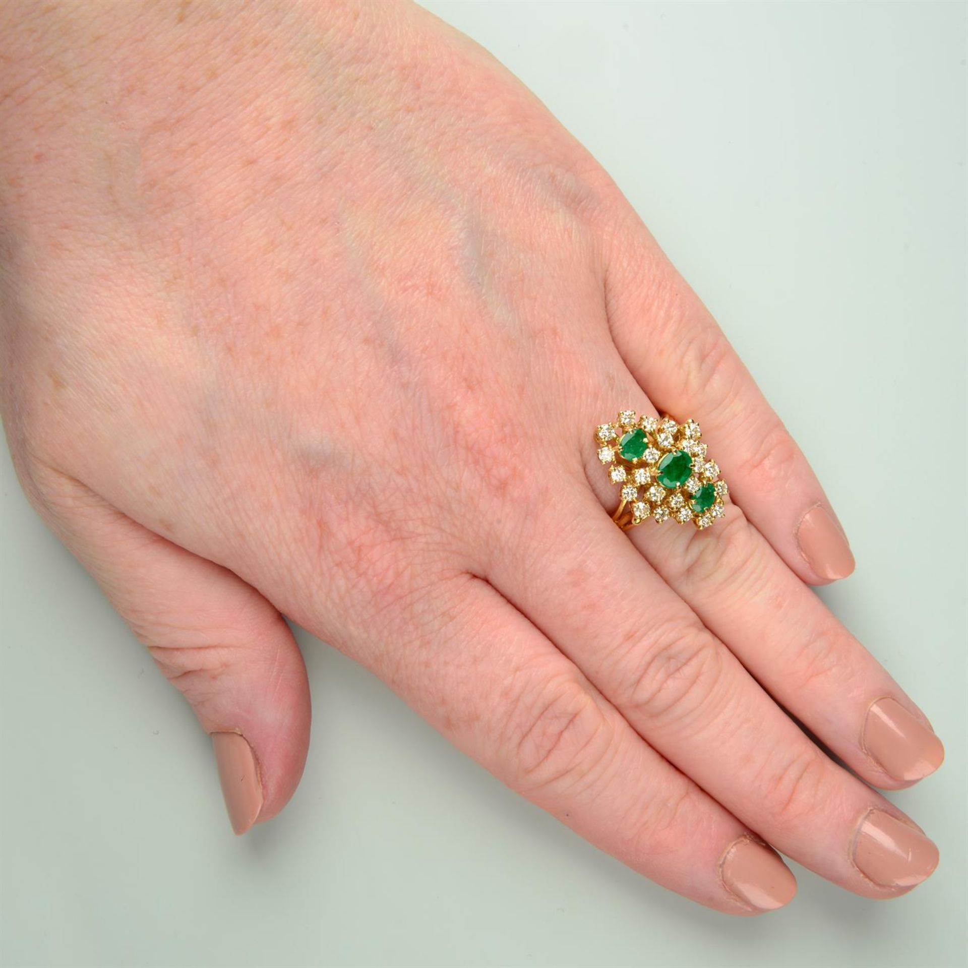 An 18ct gold emerald and brilliant-cut diamond dress ring. - Image 5 of 5