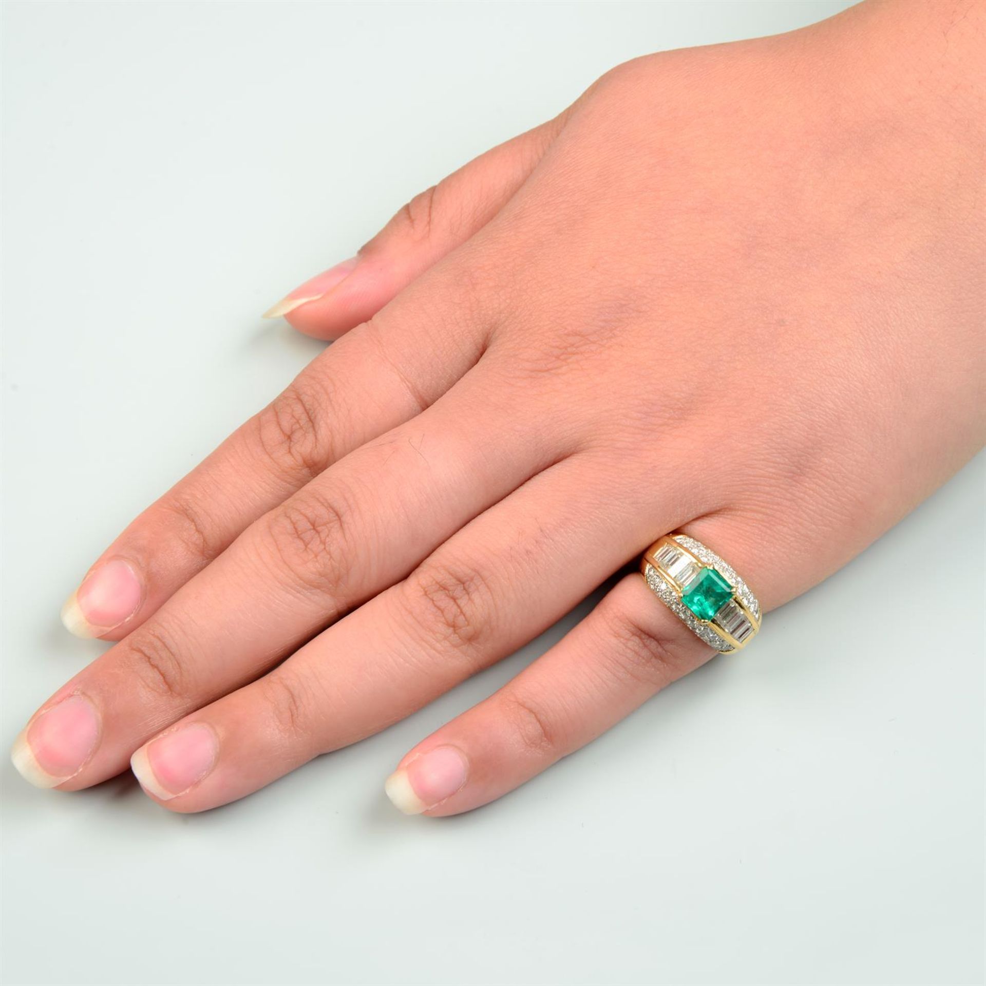 A Colombian emerald, baguette-shape and brilliant-cut diamond dress ring. - Image 5 of 5