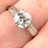 An old-cut diamond single-stone ring, with baguette-cut diamond sides.