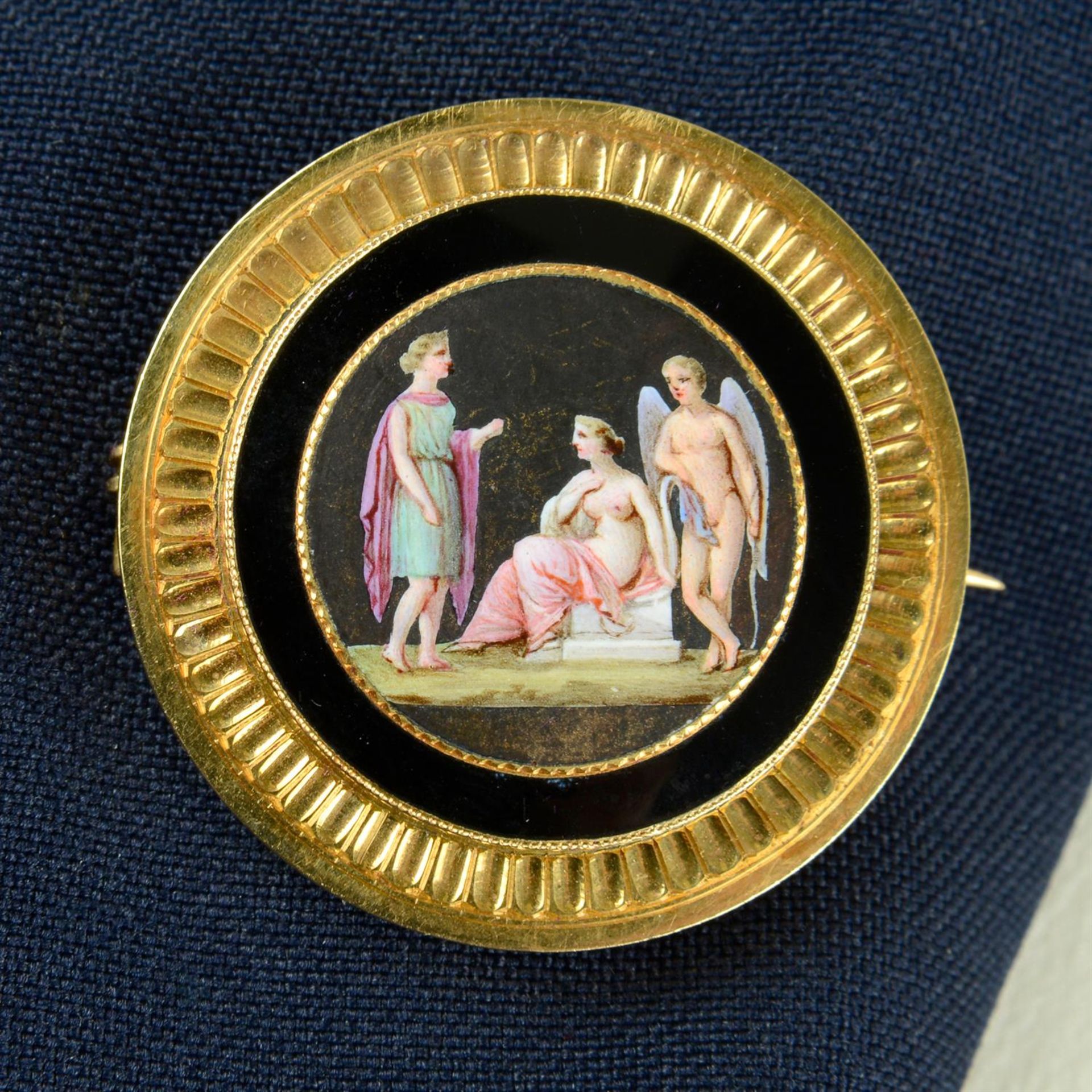 A late 19th century gold painted enamel classical scene brooch, with matching pair of studs.