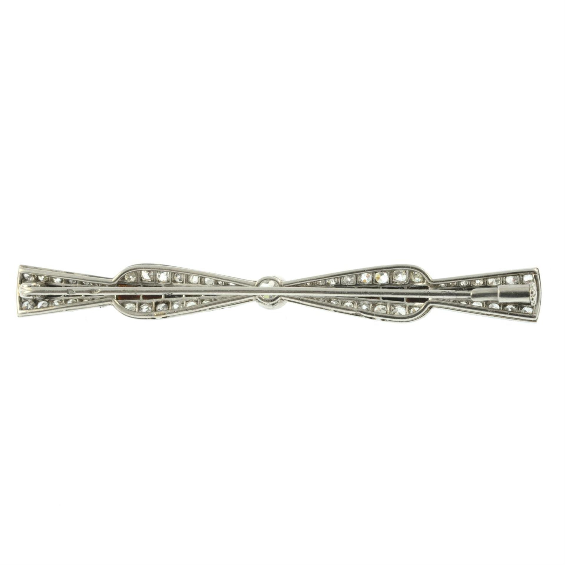 An Art Deco platinum, onyx old and single-cut diamond bow brooch. - Image 3 of 4