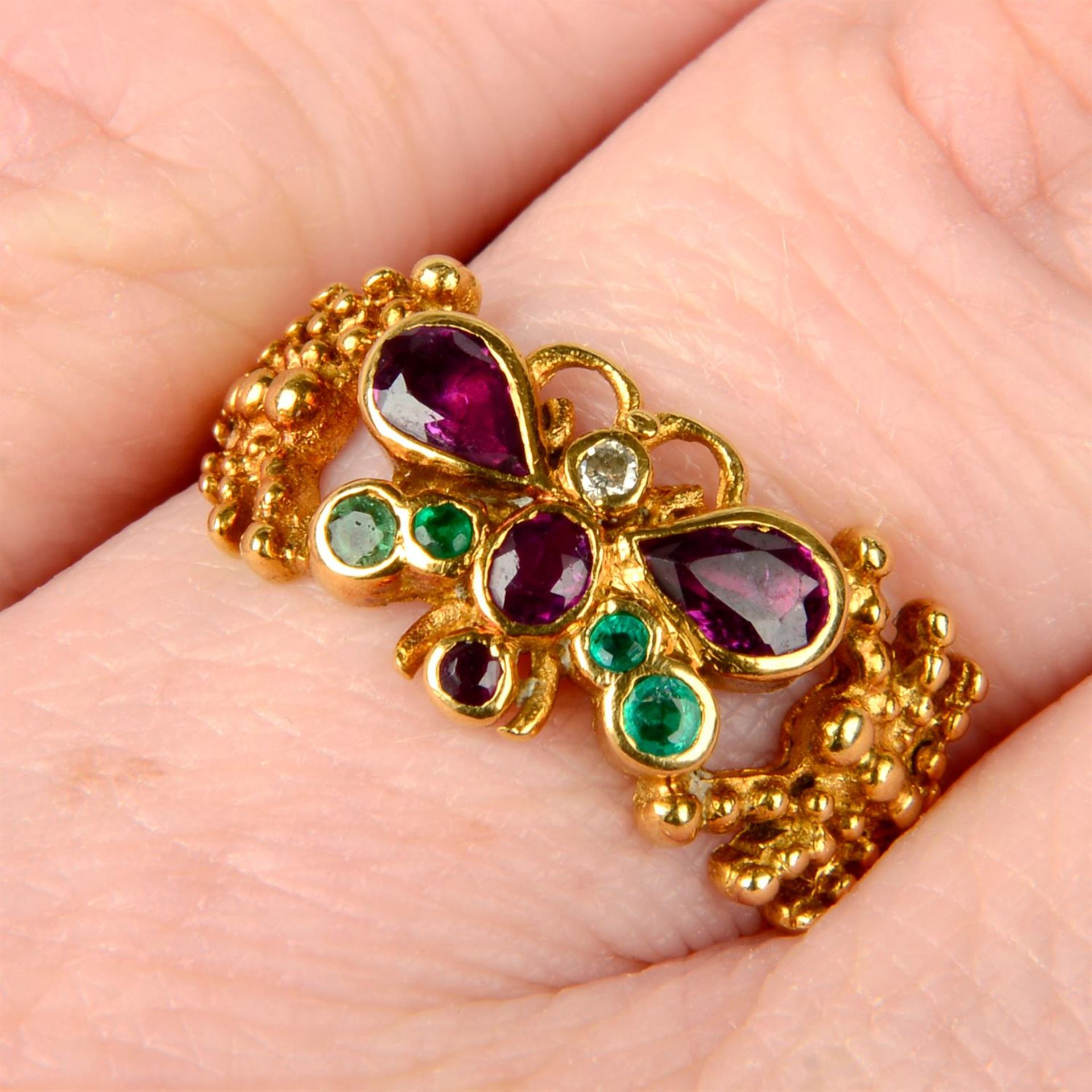 A ruby, emerald and brilliant-cut diamond butterfly ring, with cannetille sides and bead motif band.