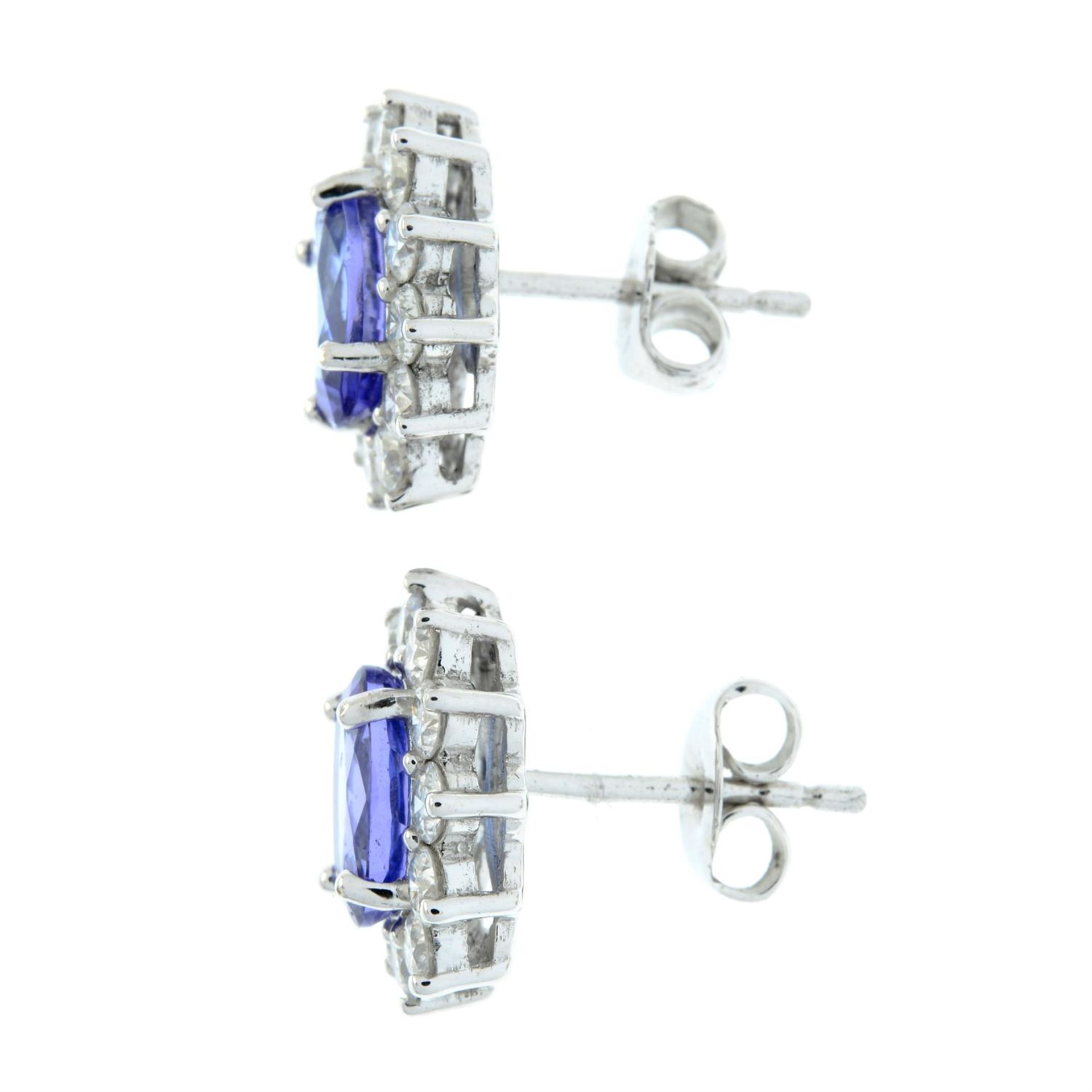 A pair of tanzanite and brilliant-cut diamond cluster earrings. - Image 4 of 4