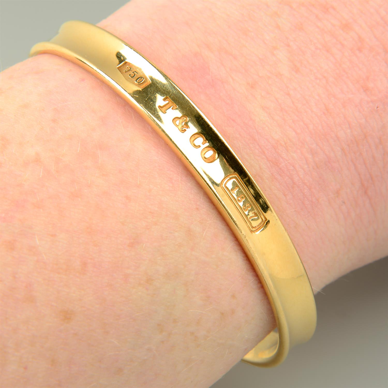 An 18ct gold '1837' cuff bangle, by Tiffany & Co.