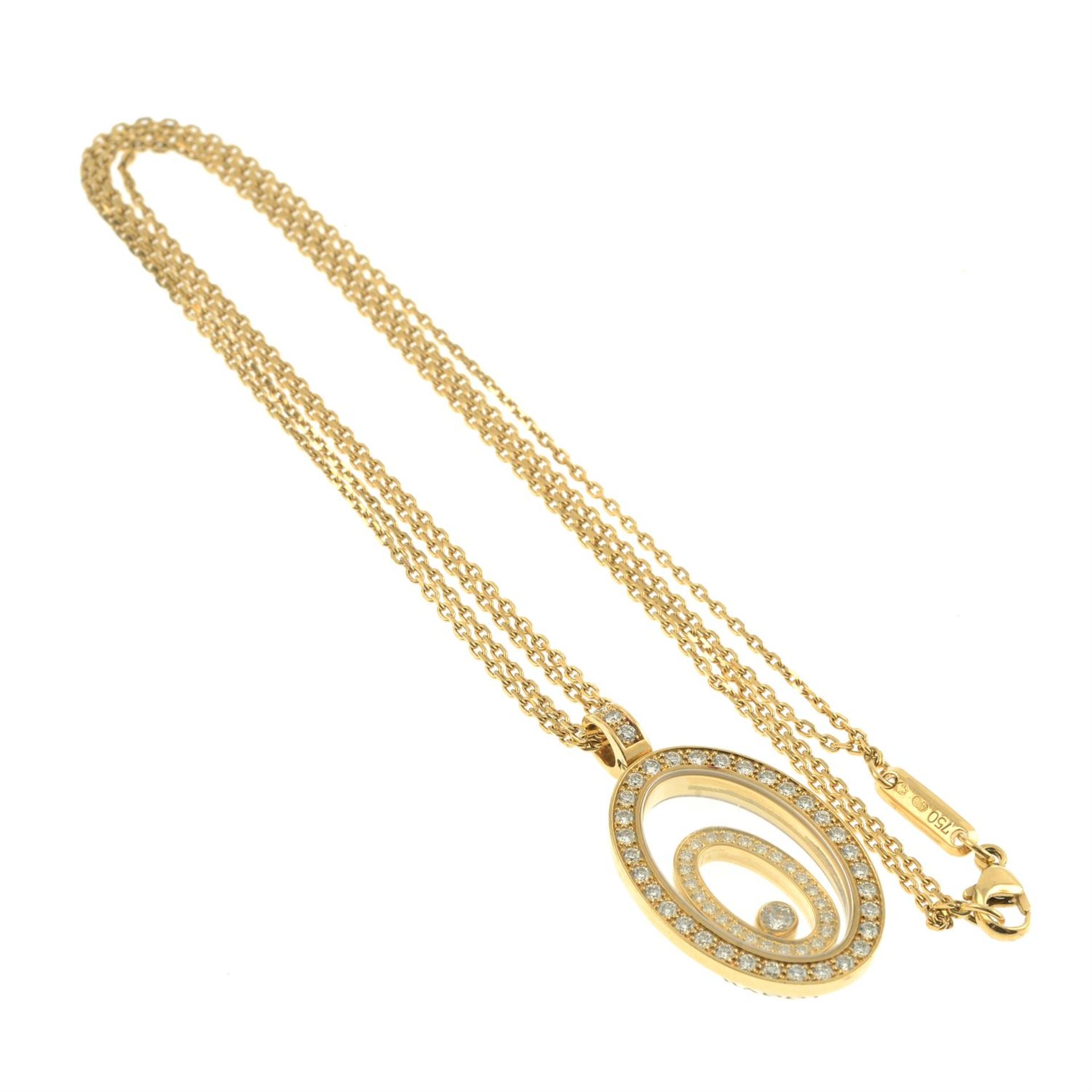 An 18ct gold brilliant-cut diamond 'Happy Spirit' pendant, with two-row chain, by Chopard. - Image 4 of 5