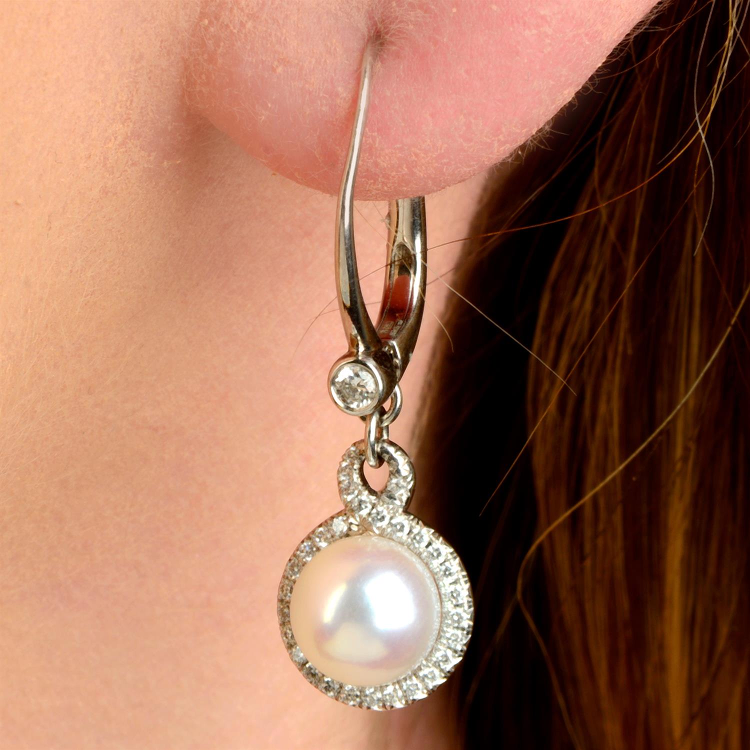 A pair of 18ct gold Akoya cultured pearl and pavé-set diamond 'Petit Soleil' earrings, by Mikimoto.