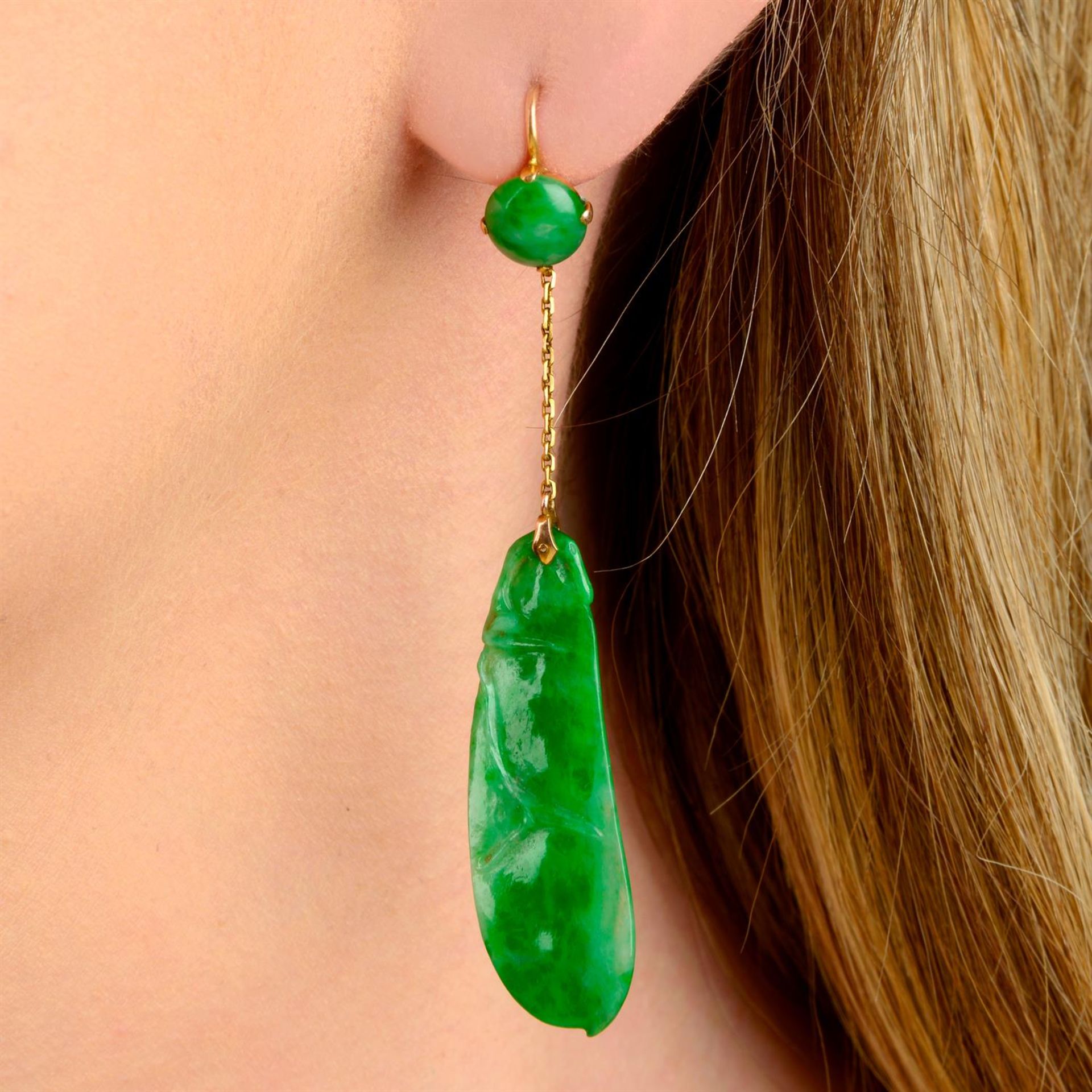 A pair of early 20th century 9ct gold carved A-type jadeite jade peapod earrings,