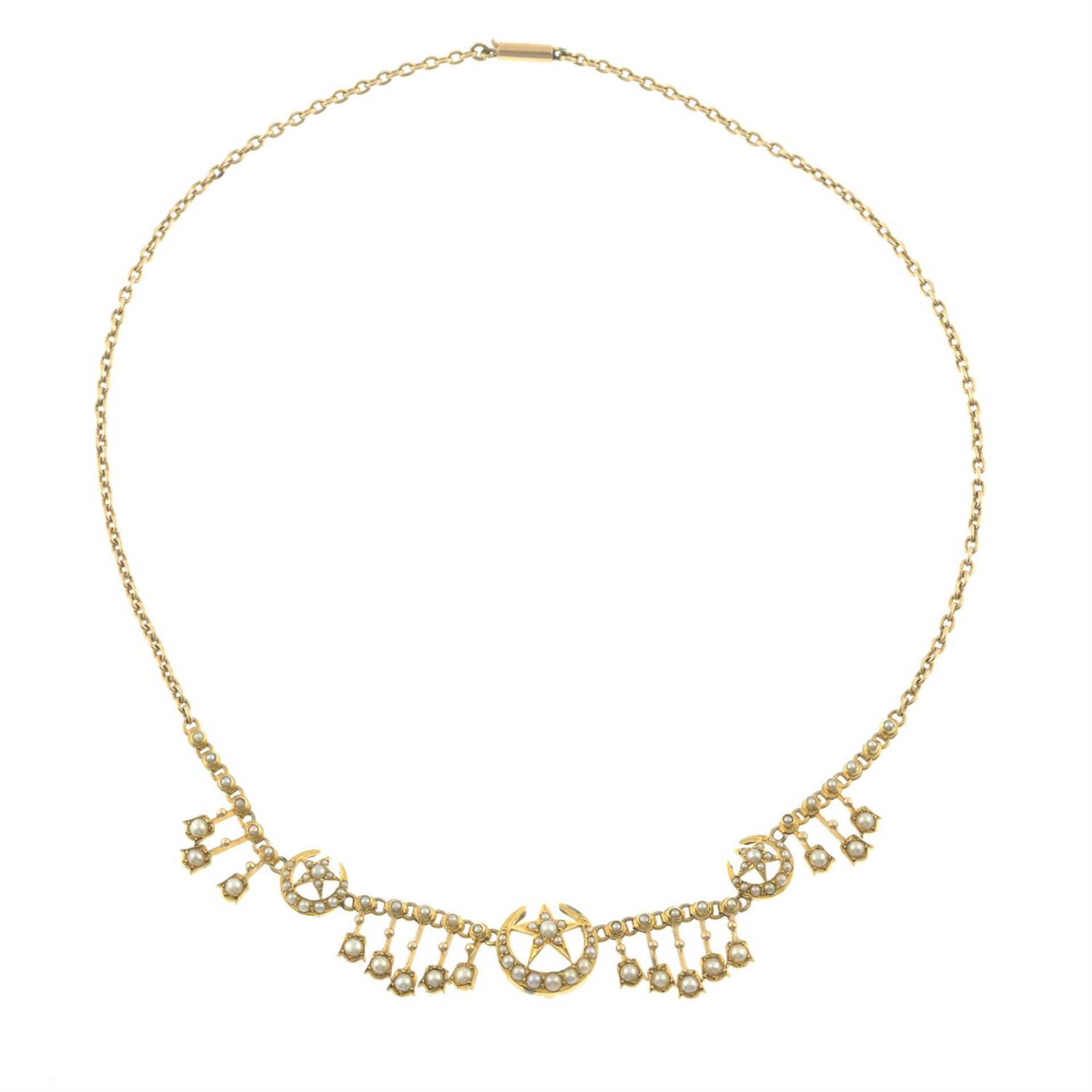 A late Victorian gold split pearl crescent moon and stars motif necklace. - Image 3 of 4