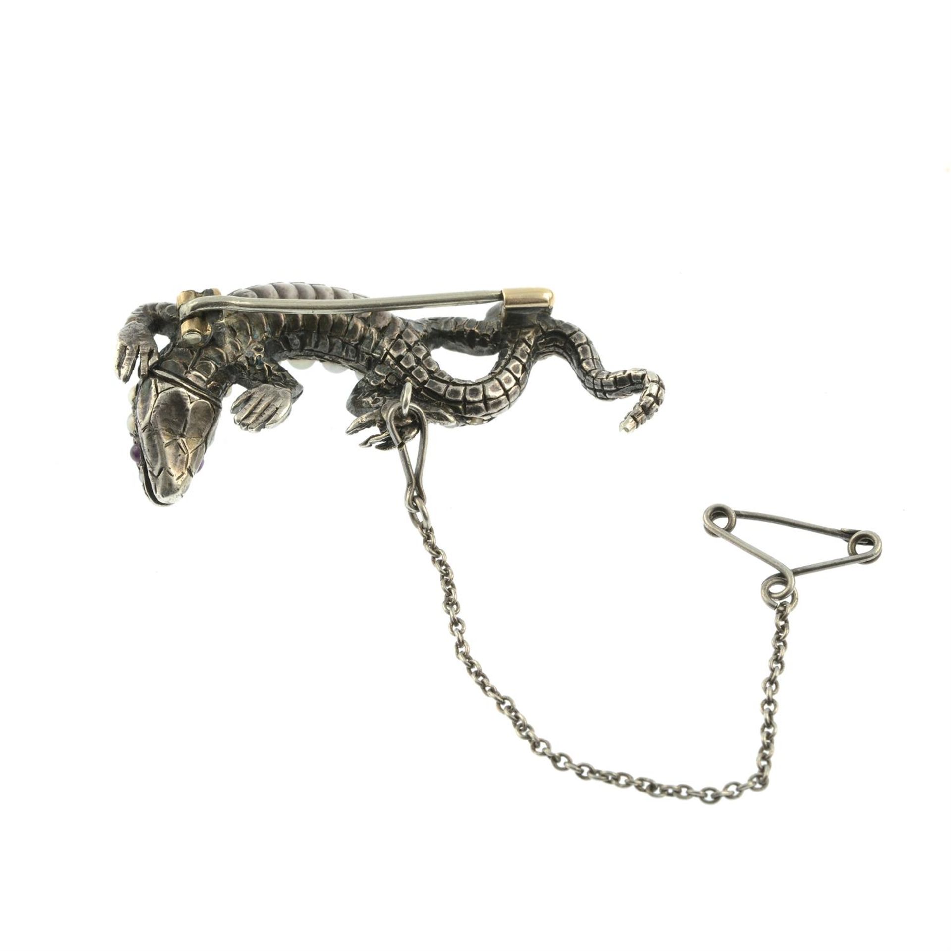 A late Victorian silver split pearl lizard brooch, with circular-cut diamond crest and ruby - Image 3 of 4