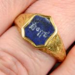 A late 19th century gold cased signet ring, the shield-shape lapis lazuli engraved 'Polly'.