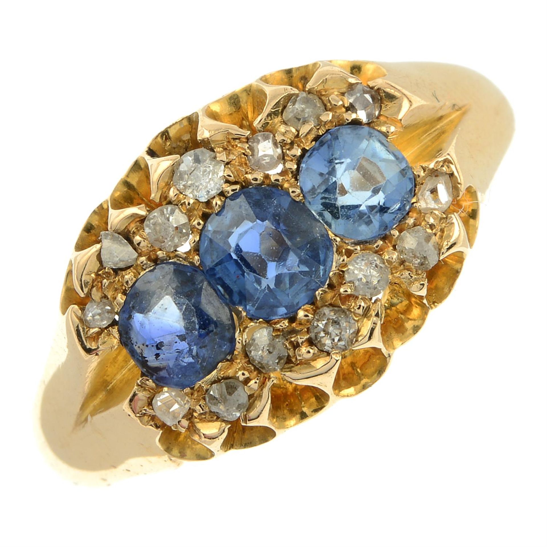 A late Victorian 18ct gold sapphire three-stone ring, with rose and old-cut diamond surround. - Image 2 of 6