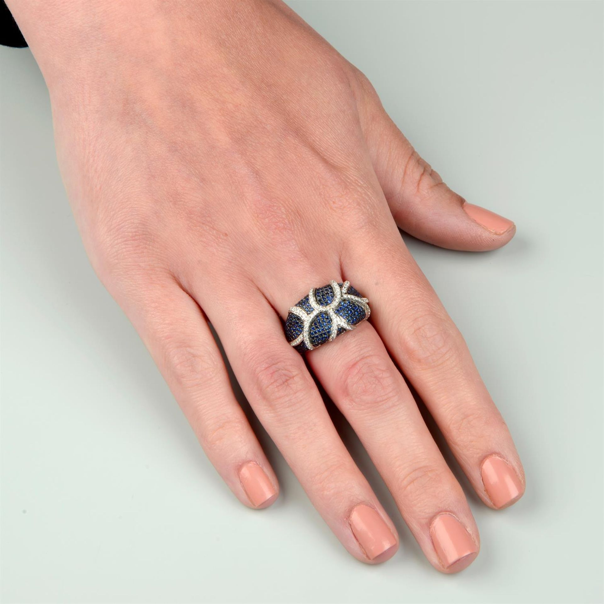 An 18ct gold pavé-set sapphire and brilliant-cut diamond stylised organic dress ring. - Image 5 of 5