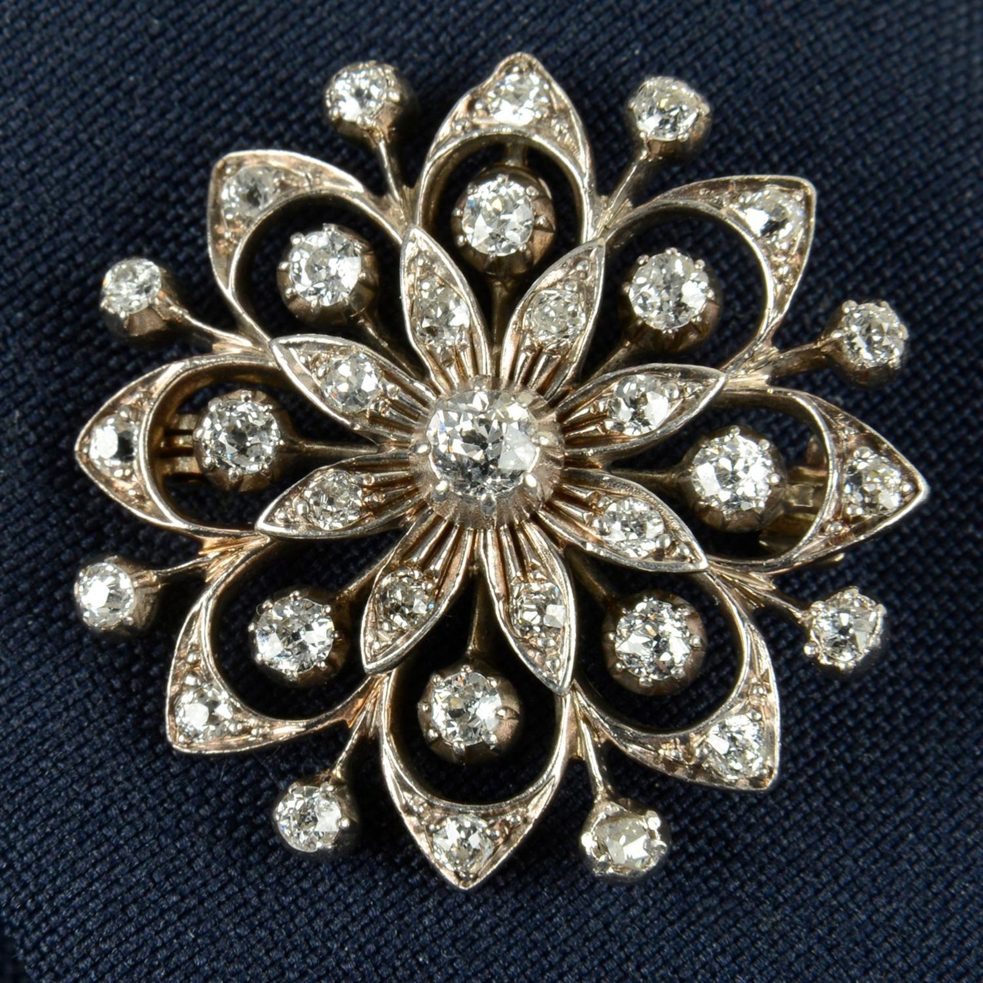 A late Victorian silver and gold old-cut diamond floral brooch.