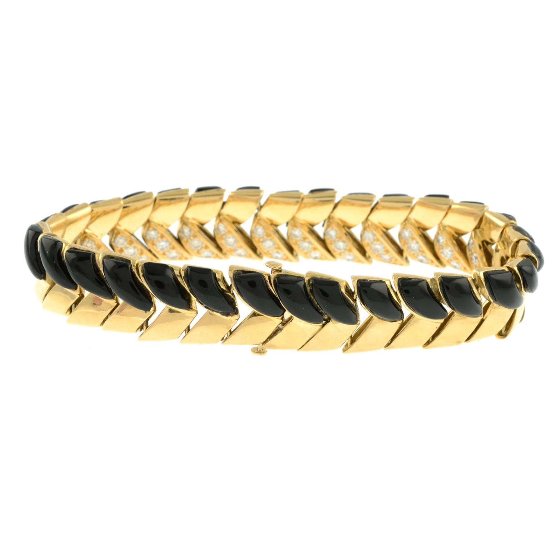 A mid 20th century 18ct gold onyx and brilliant-cut diamond reversible panel bracelet, - Image 3 of 3