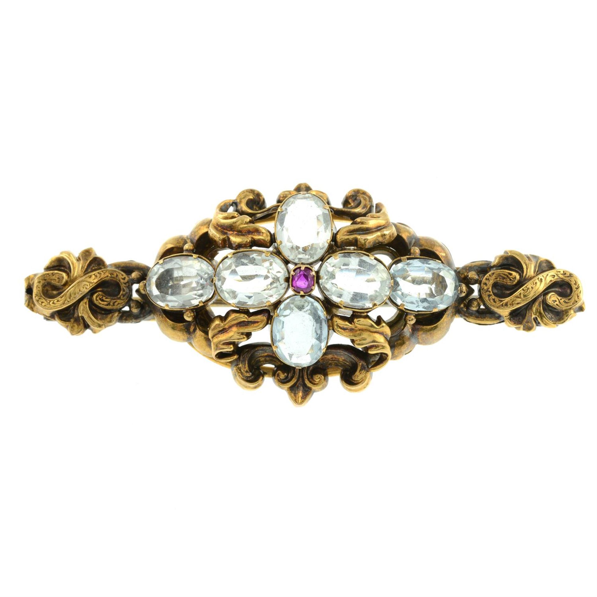 A mid 19th century gold aquamarine and ruby scrolling foliate brooch. - Image 2 of 4