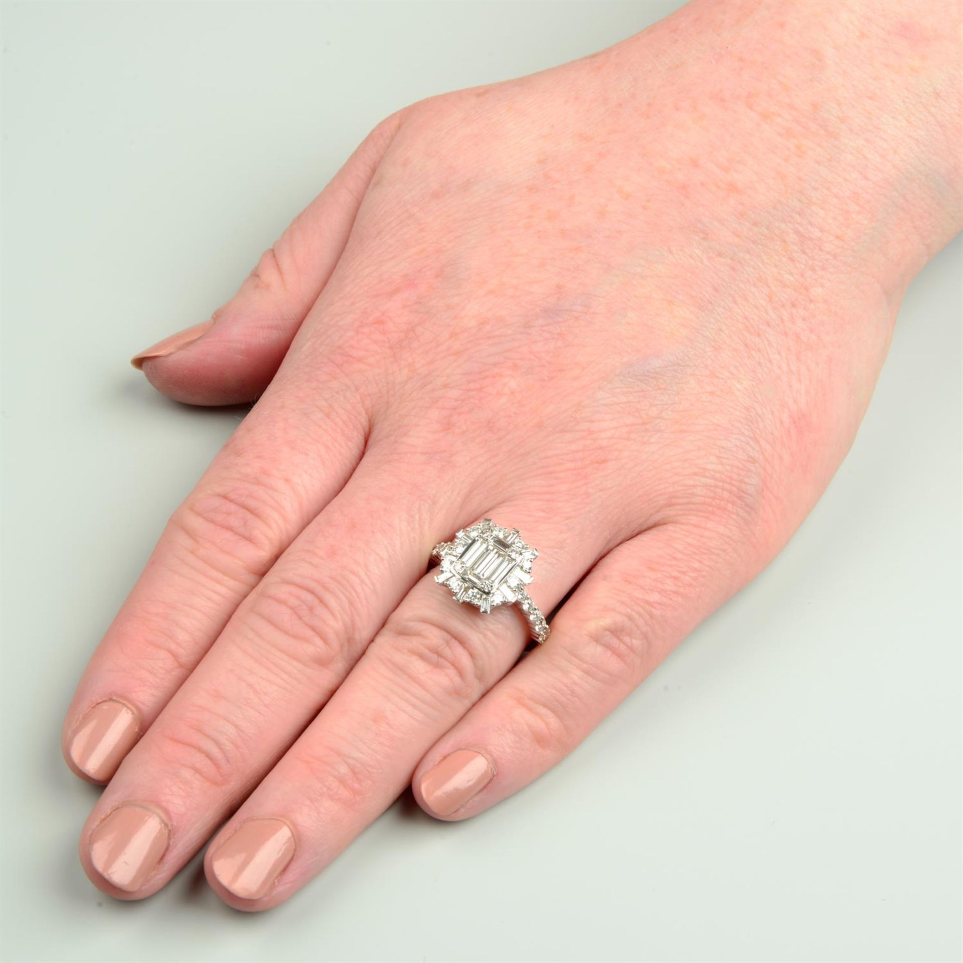 A baguette and brilliant-cut diamond dress ring. - Image 5 of 5