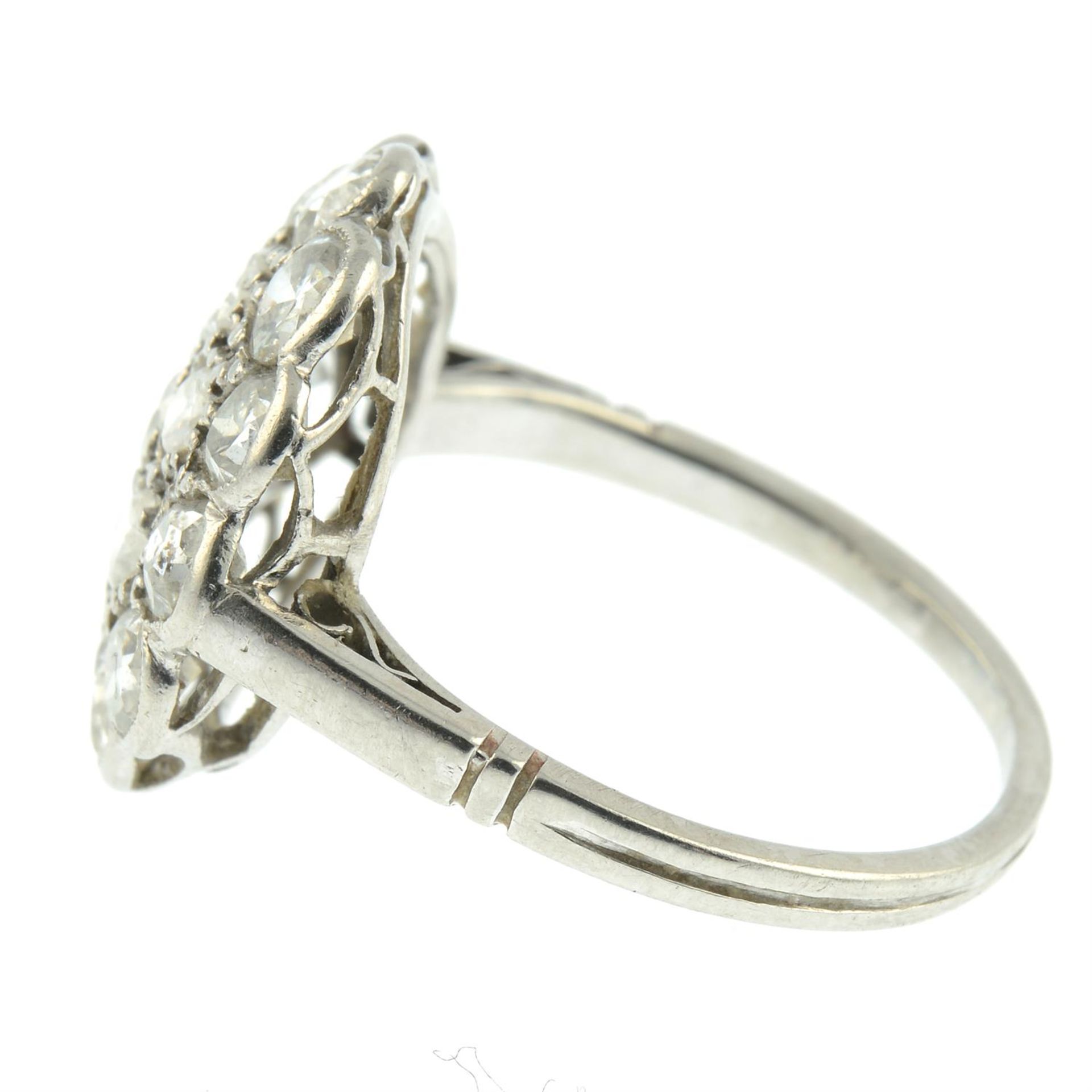 An early to mid 20th century platinum circular-cut diamond cluster ring. - Image 3 of 5