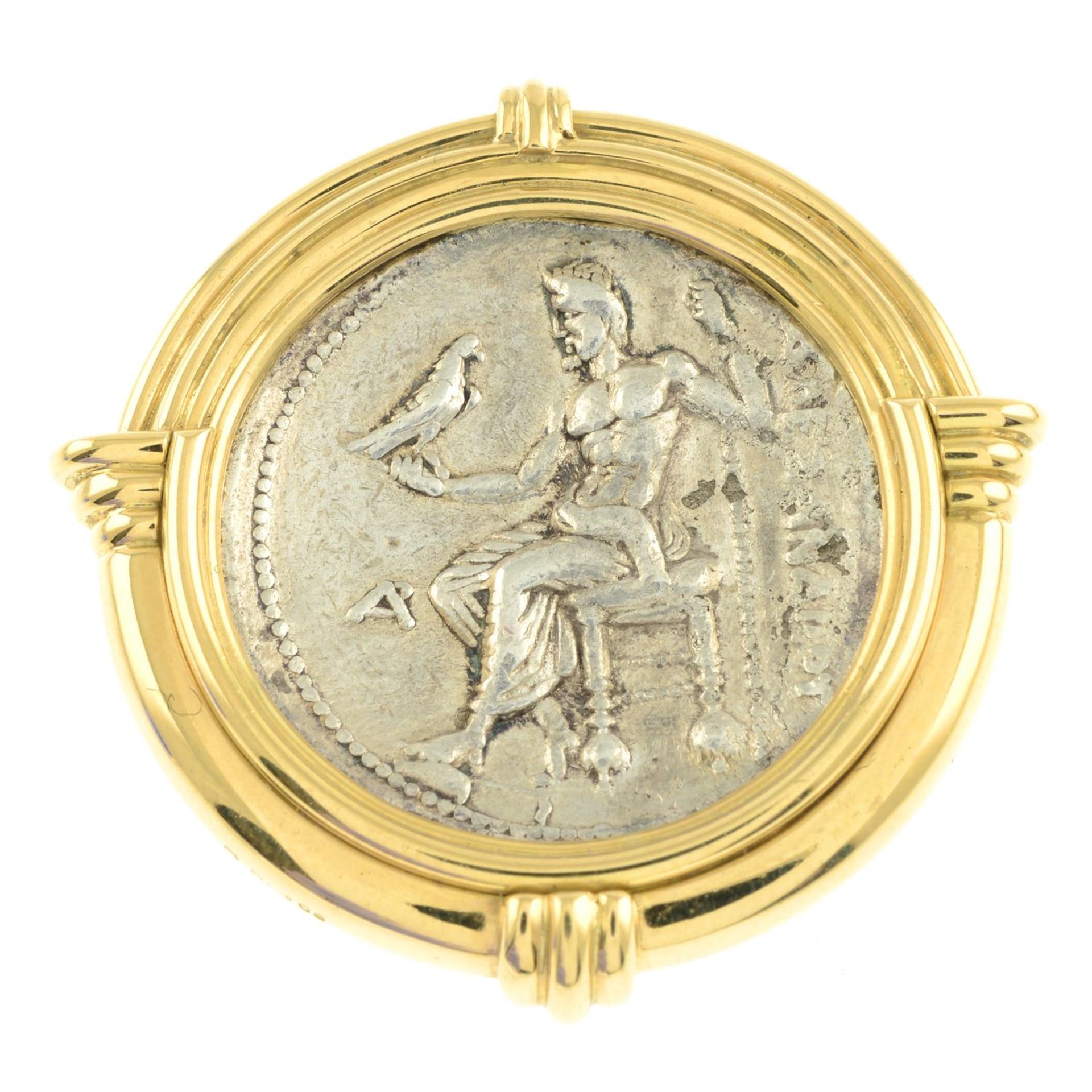 An unverified Greek or Macedonian coin or replica, mounted in an 18ct gold clip by Theo Fennell. - Image 2 of 4