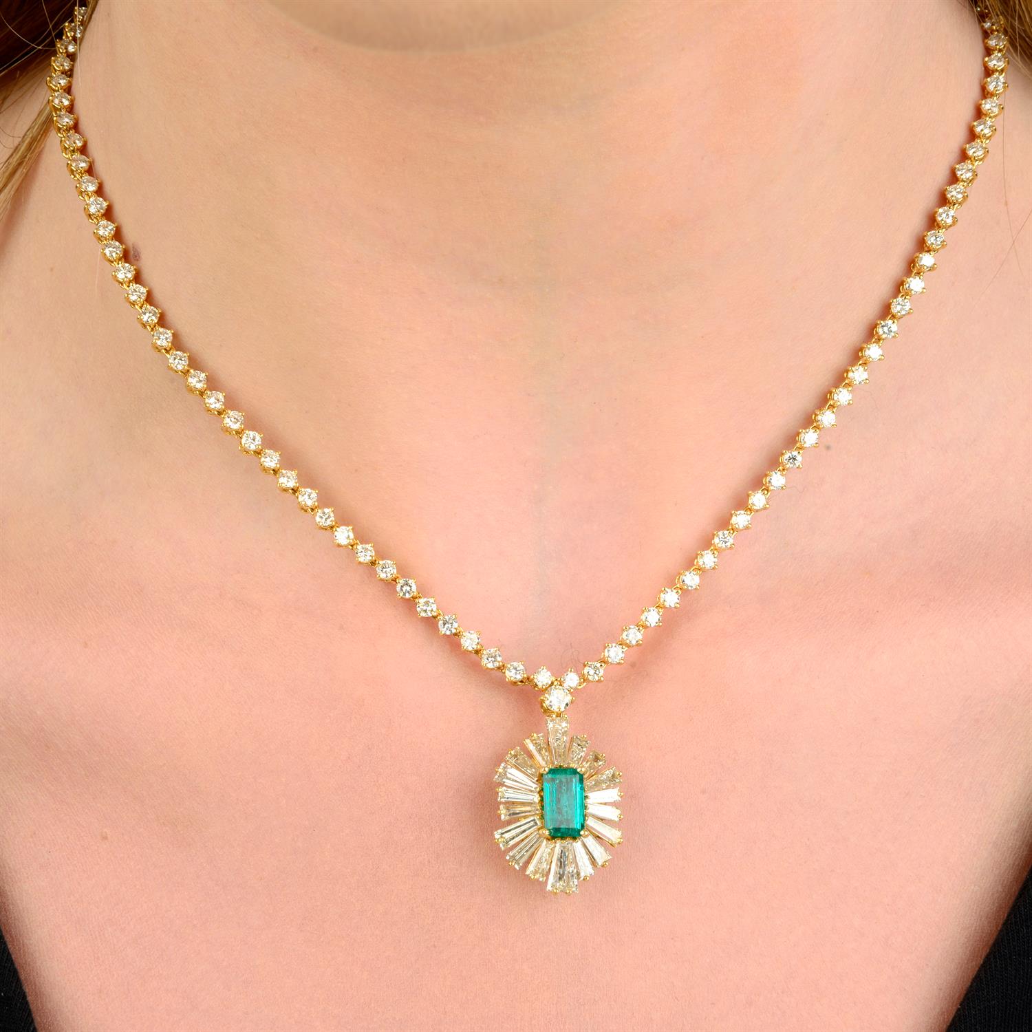 An emerald and tapered baguette-cut diamond pendant, on brilliant-cut diamond chain. - Image 5 of 5