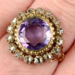 An early 19th century silver and gold amethyst and diamond point ring.