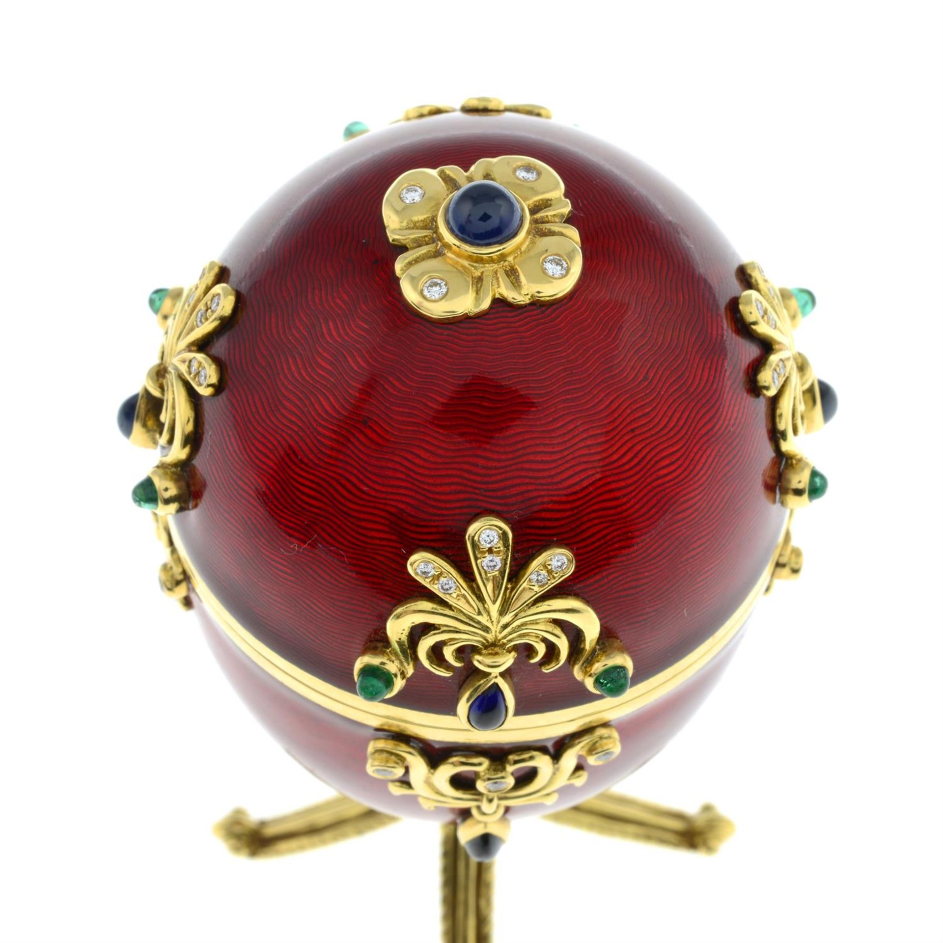 A limited edition red enamel and multi-gem egg sculpture, with hinged portrait interior, - Image 7 of 7