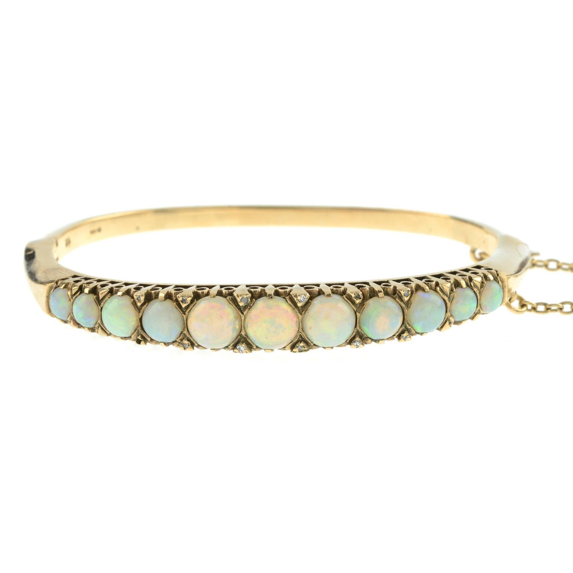 A 9ct gold opal and single-cut diamond spacer hinged bangle. - Bild 2 aus 3