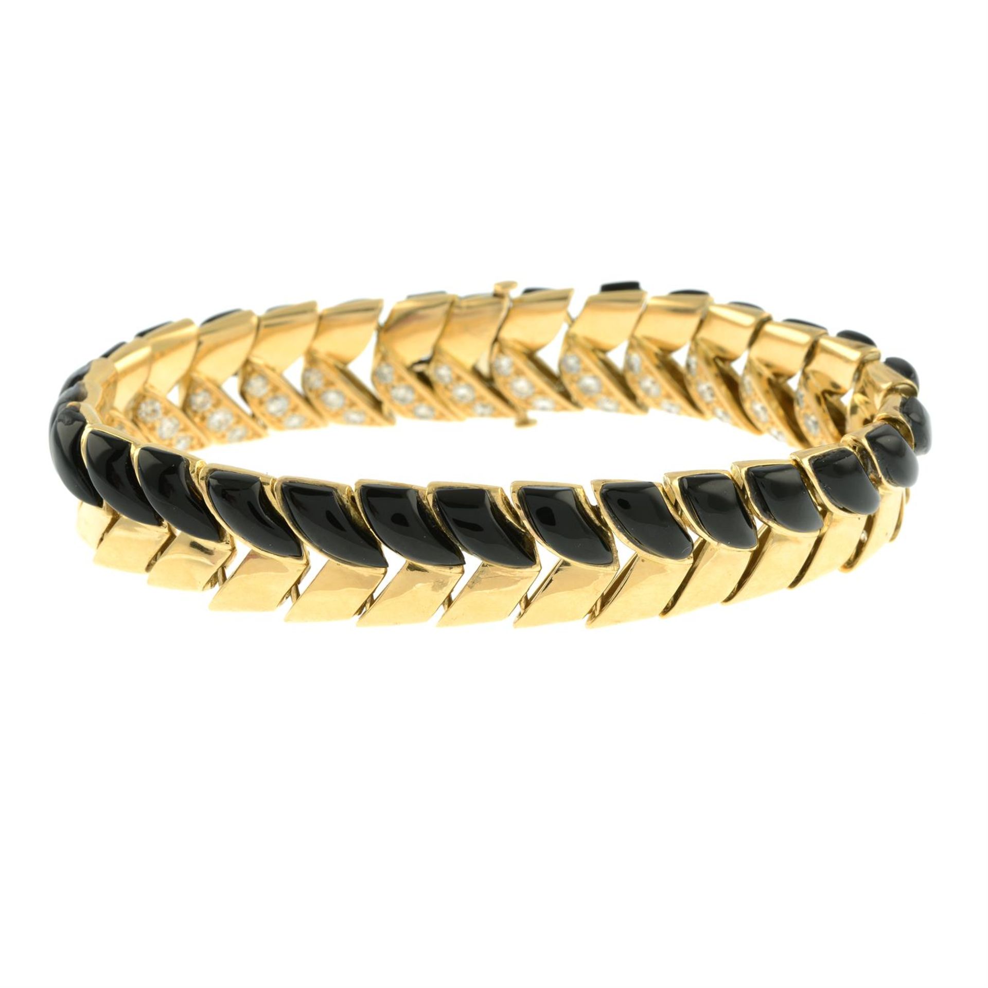 A mid 20th century 18ct gold onyx and brilliant-cut diamond reversible panel bracelet, - Image 2 of 3