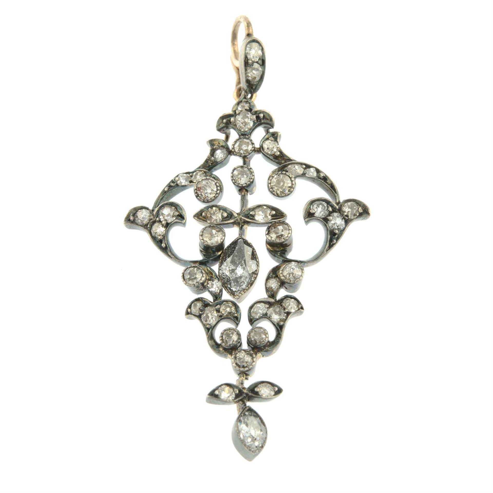 A late 19th century silver and gold old-cut and marquise-shape diamond scrolling foliate pendant. - Image 2 of 4