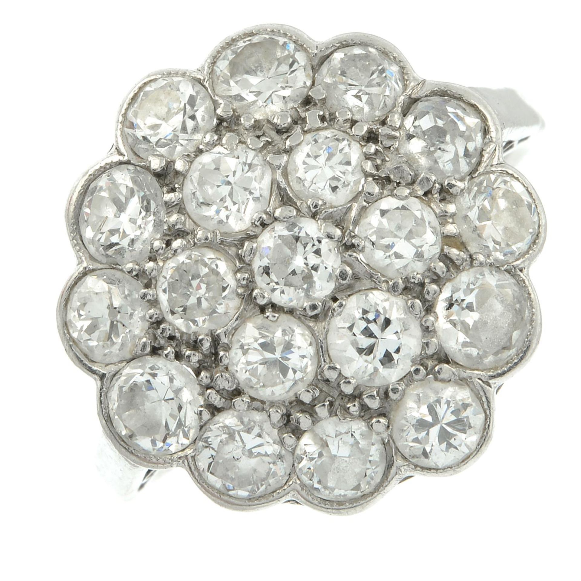 An early to mid 20th century platinum circular-cut diamond cluster ring. - Image 2 of 5