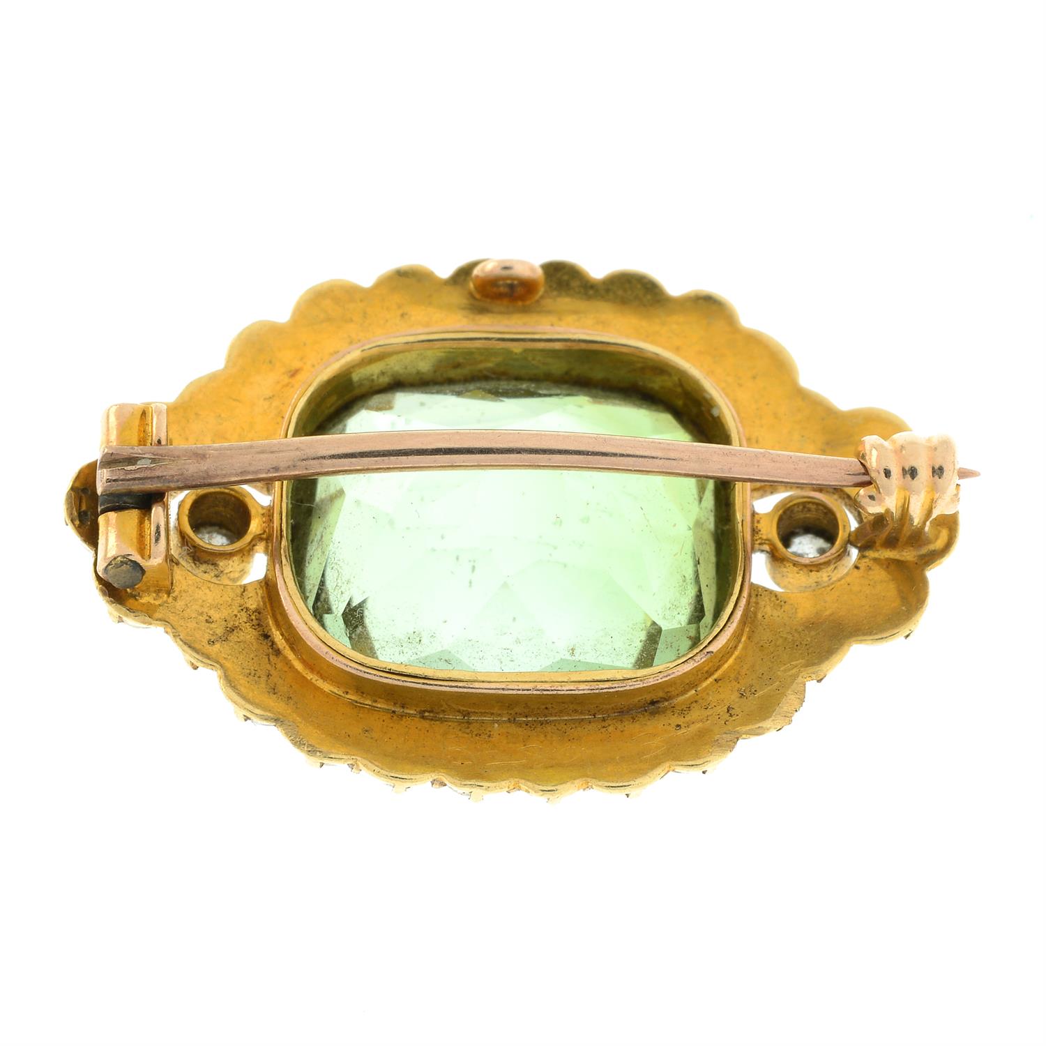 A late 19th century gold green tourmaline brooch, with split pearl and old-cut diamond surround. - Image 3 of 4